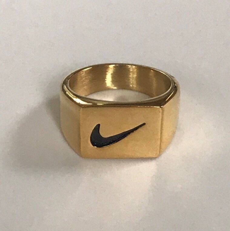 Nike Nike swoosh stainless steel signet ring gold | Grailed