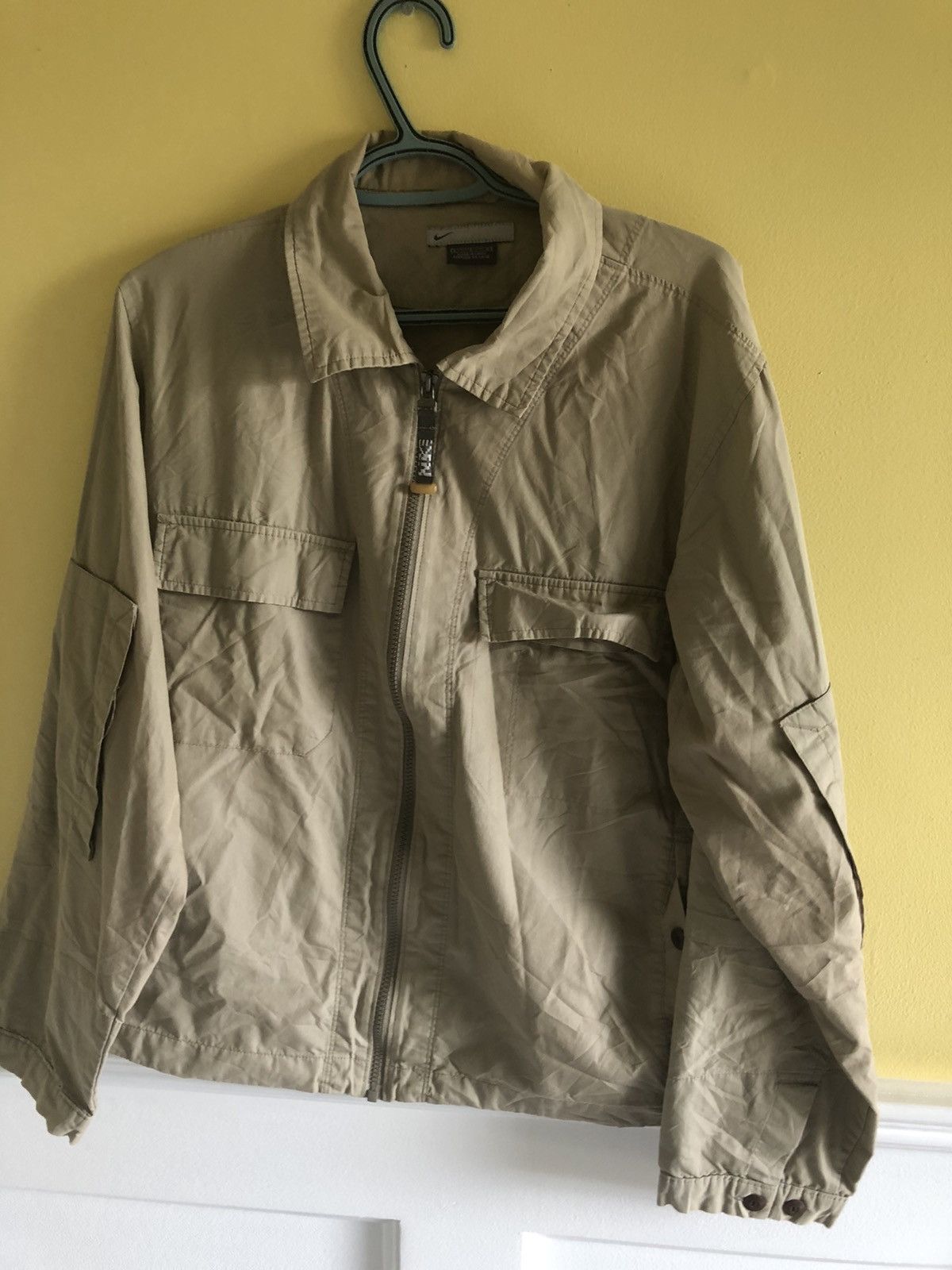 beige nike jacket