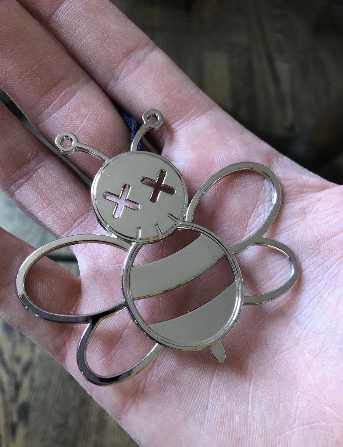 Dior x kaws keychain deals
