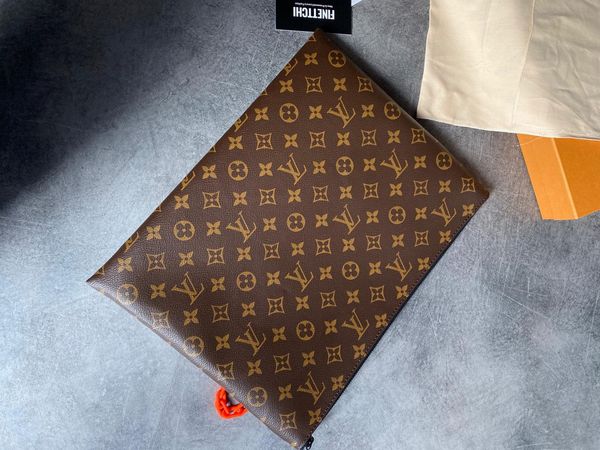 Louis Vuitton LOUIS VUITTON A4 Pouch Monogram Brown | Grailed