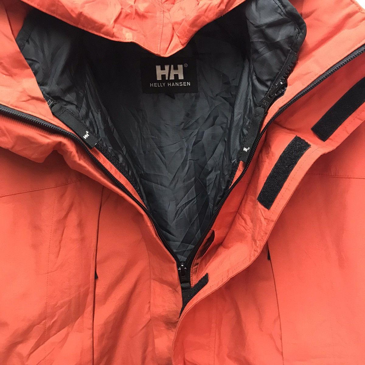 Helly Hansen Ski jacket winter hooded orange color Size US L / EU 52-54 / 3 - 4 Thumbnail