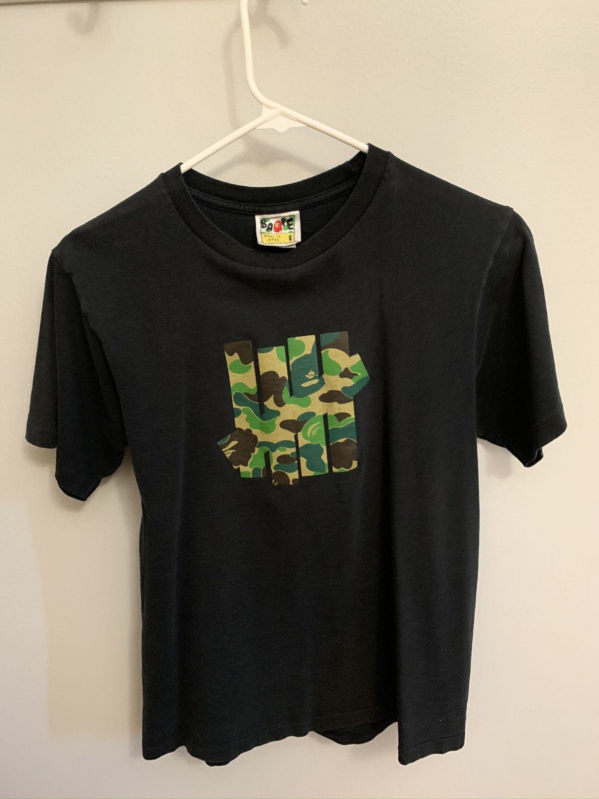 Bape x undefeated tee best sale