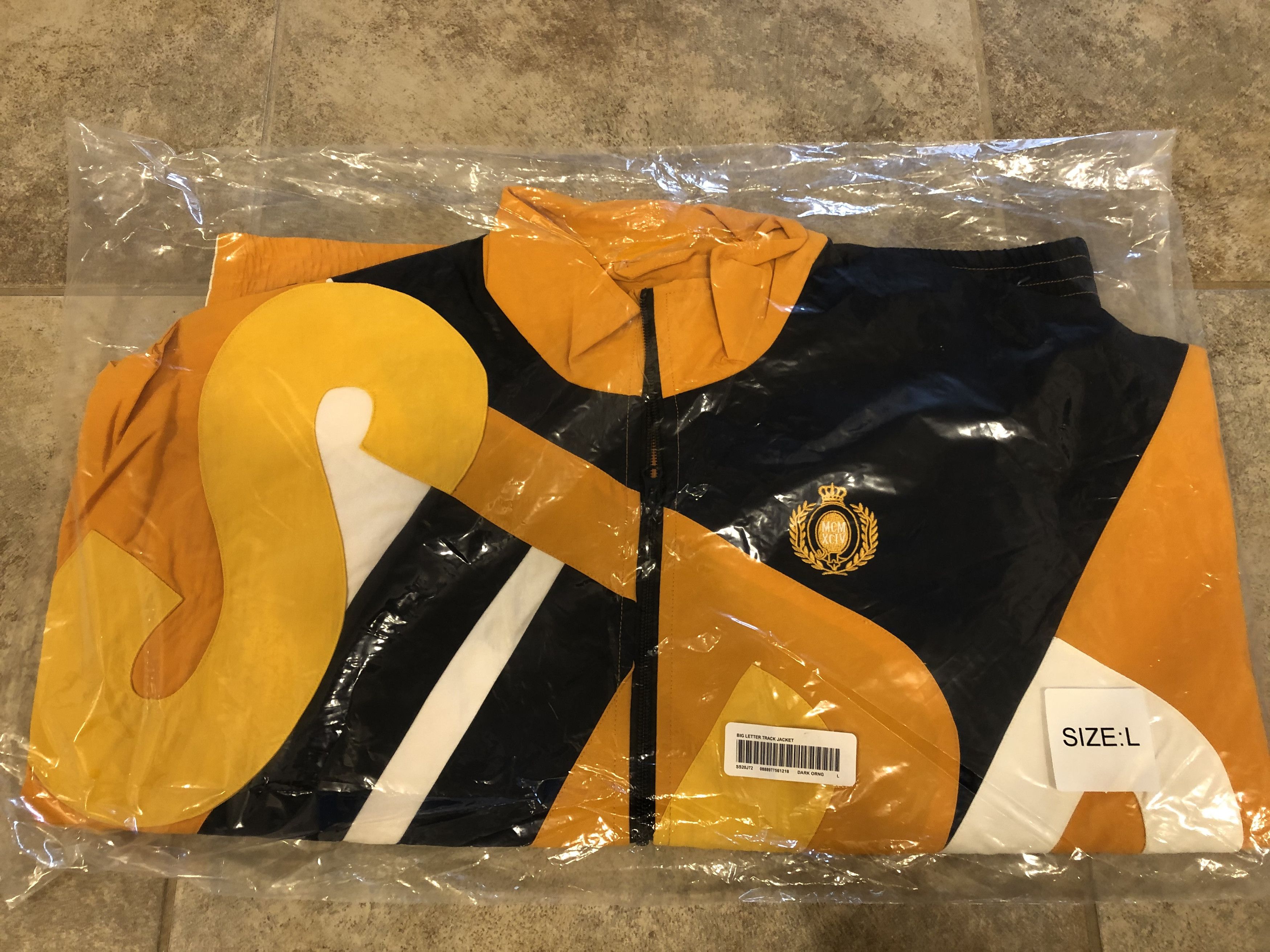 Supreme big letter track jacket dark orange hotsell