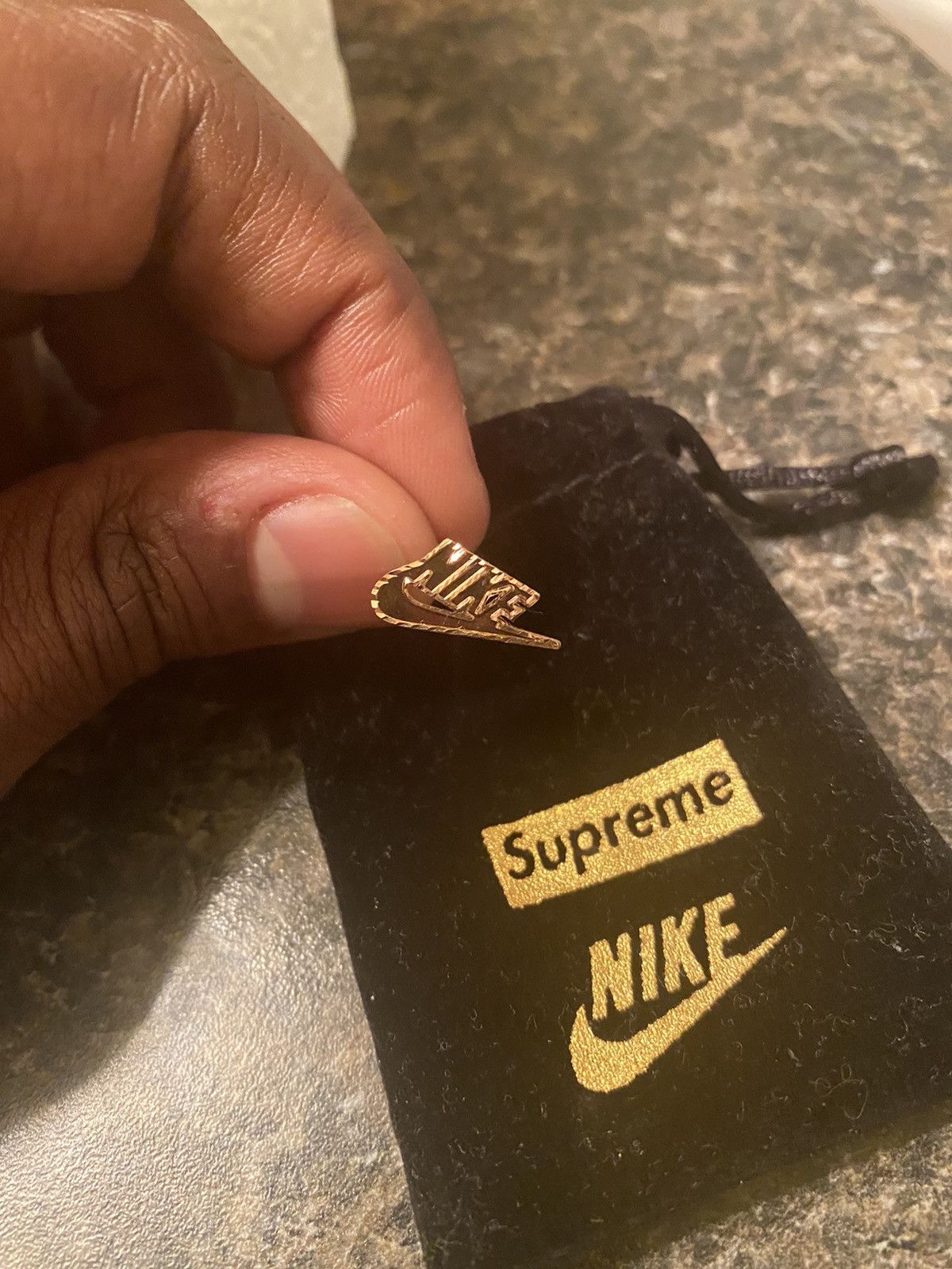 Supreme nike 2024 gold earring