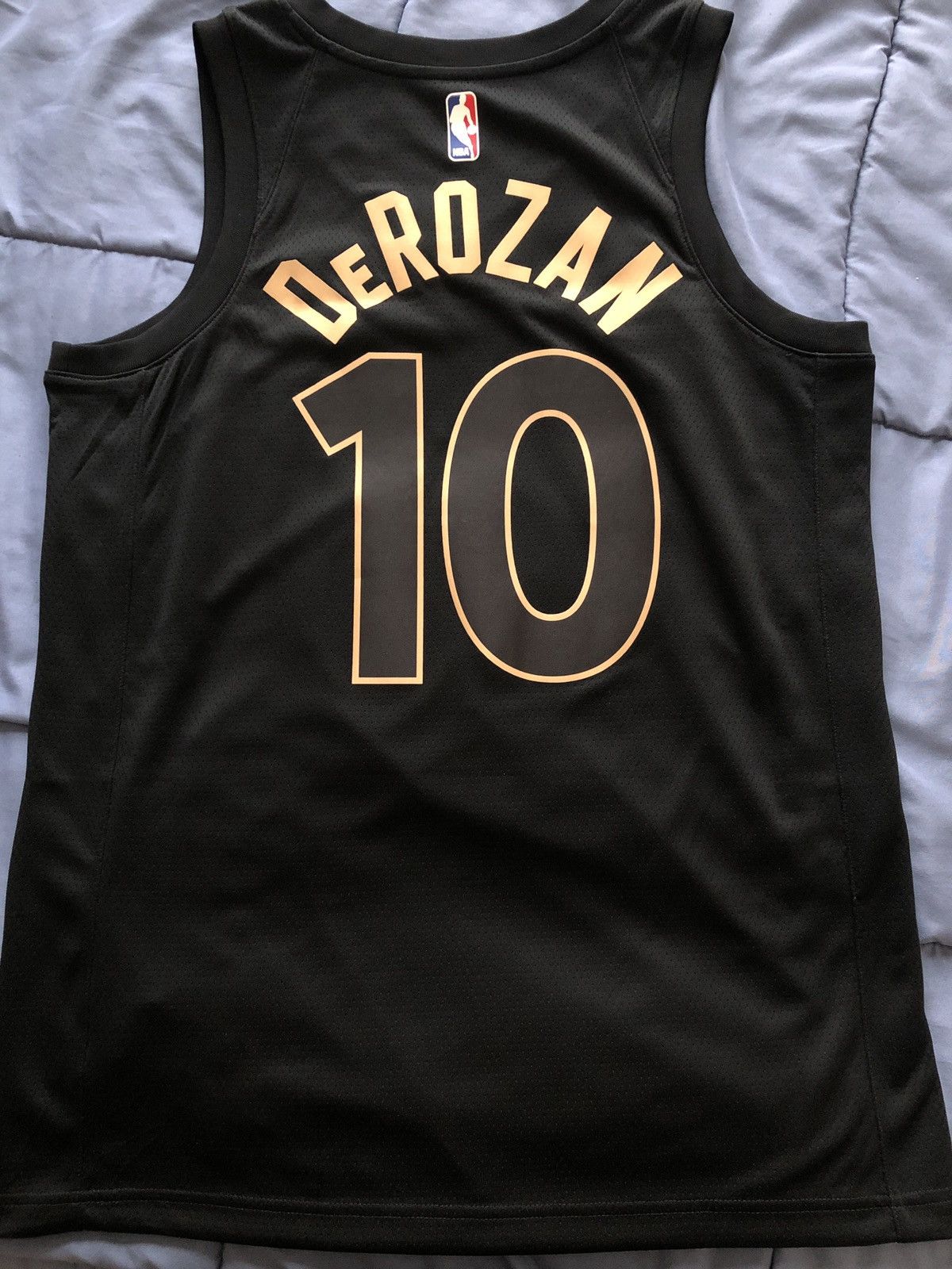 Derozan ovo shops jersey