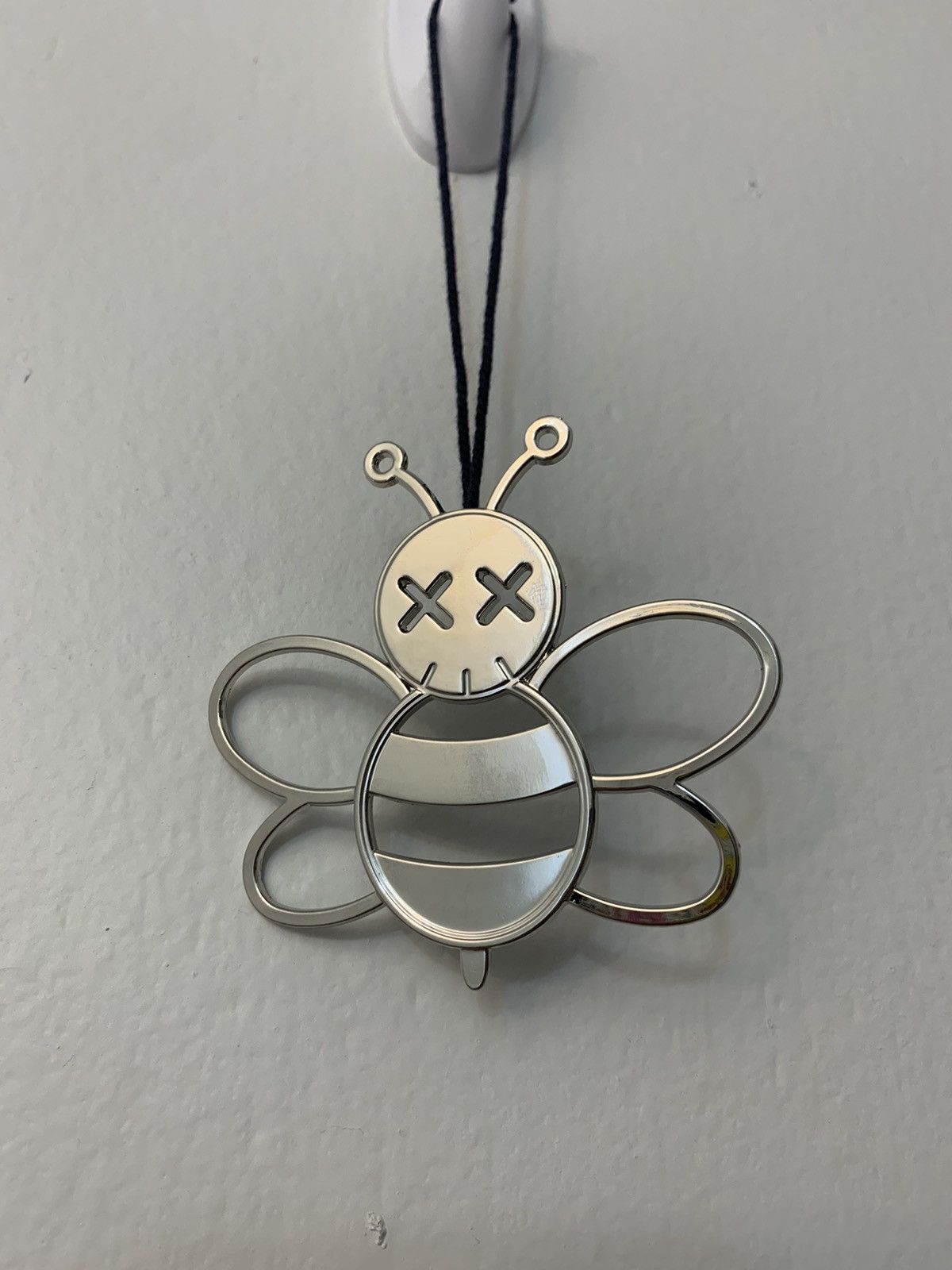 dior kaws charm