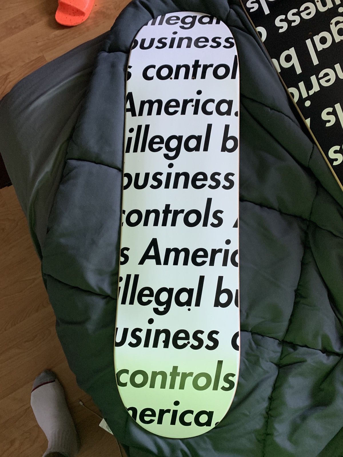 image of Supreme Illegal Business Skateboard in White, Men's