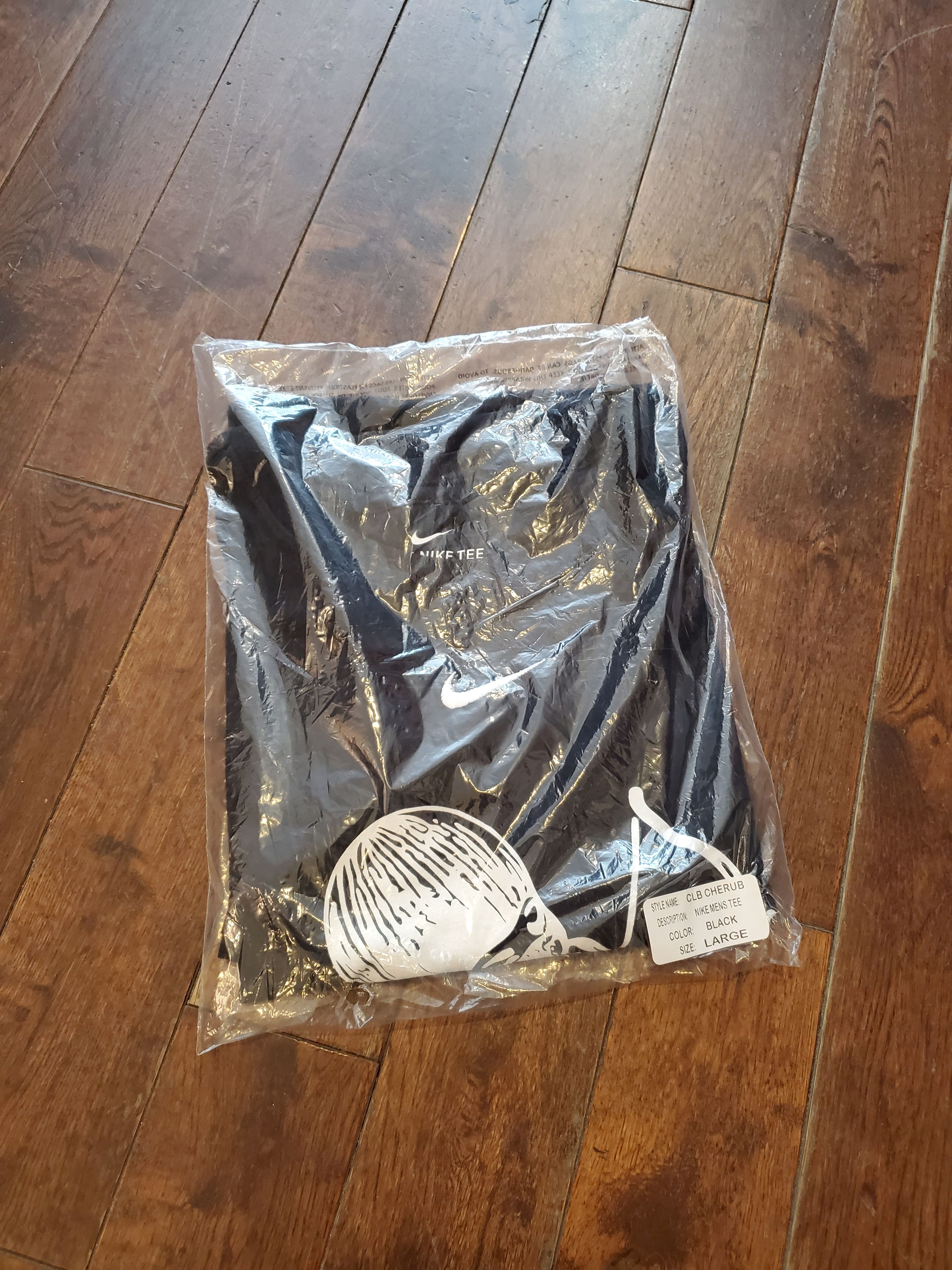 OVO x Nike CLB Cherub Centre Swoosh Shirt