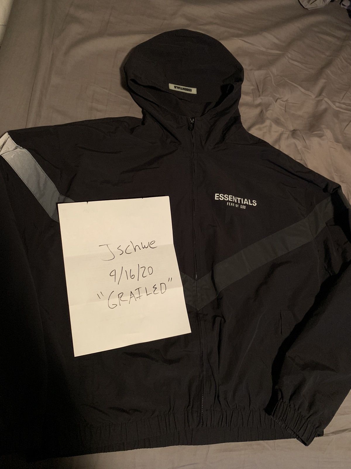 Fear of god essentials zip anorak windbreaker jacket black sale