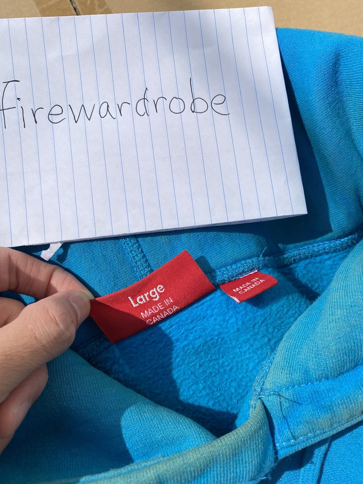 Red on cheap teal box logo