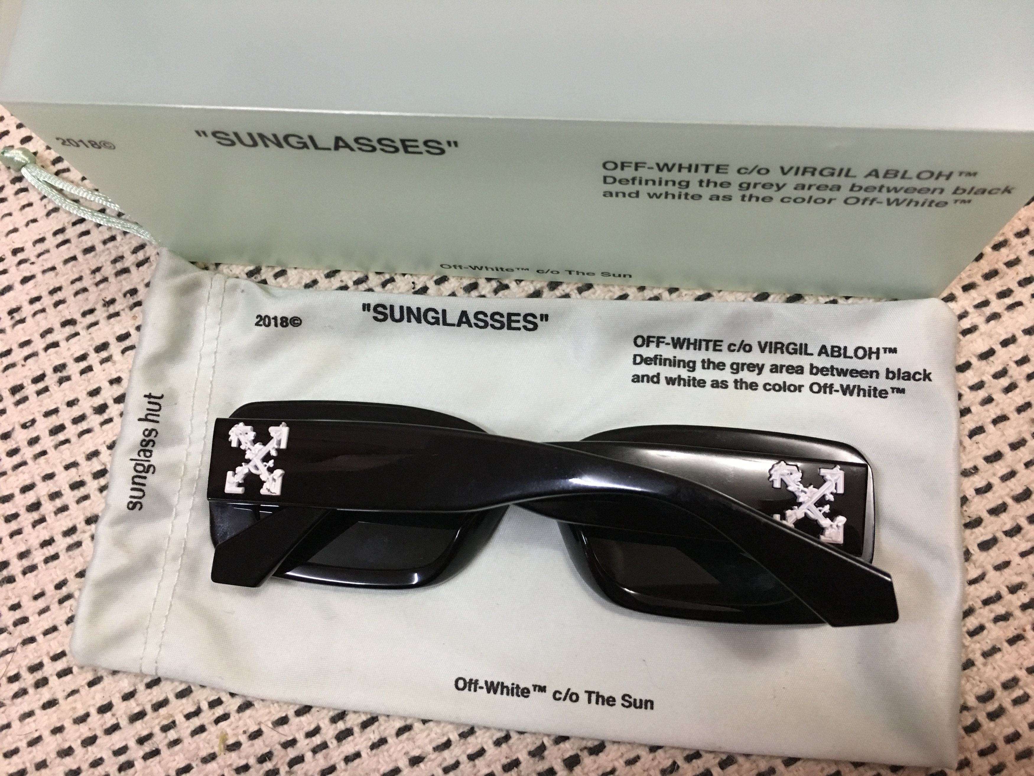Off white sunglass hut black sale