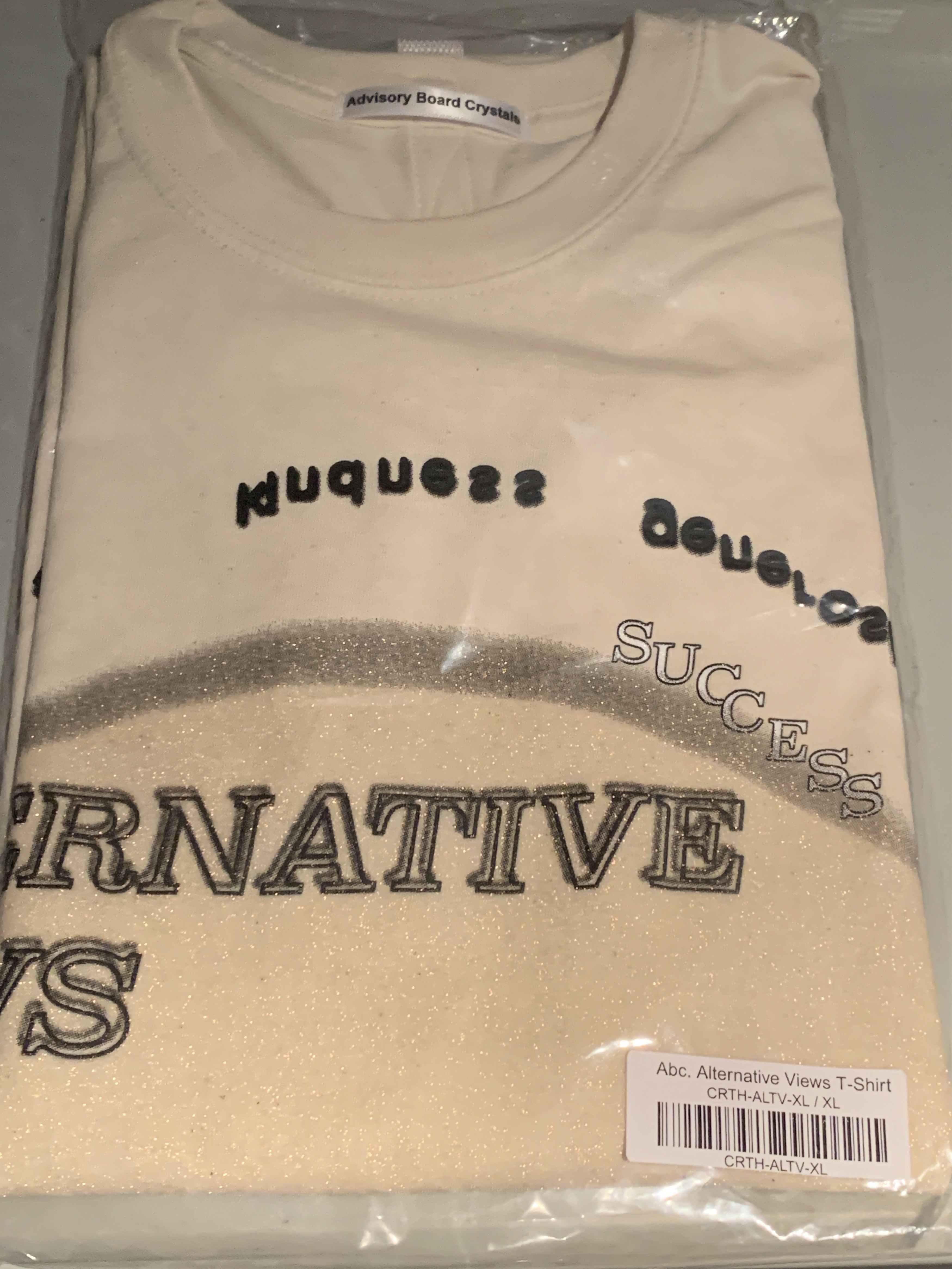 Advisory Board Crystals Abc. “Alternative Views” Tee
