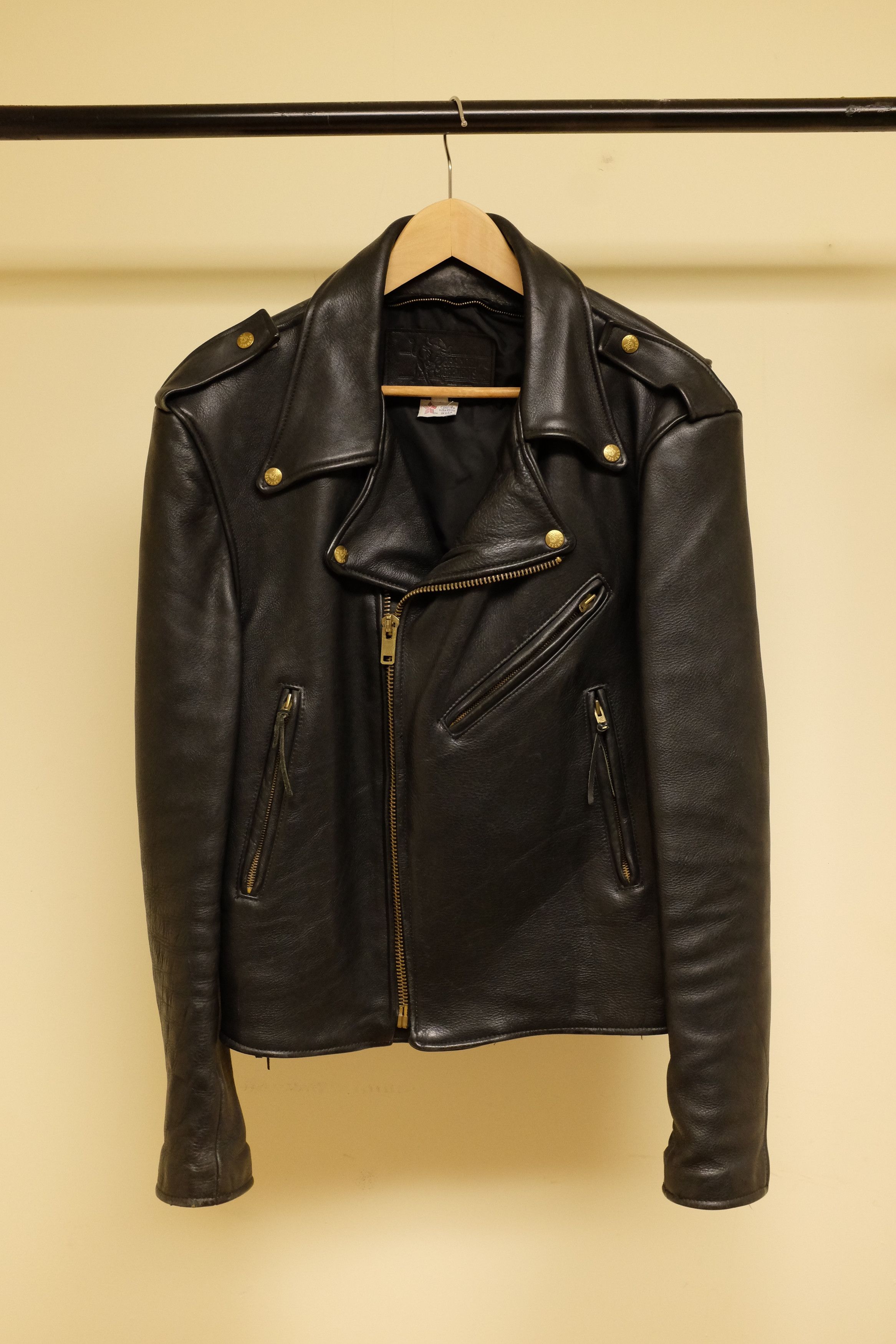 Branded leather rider marked 44