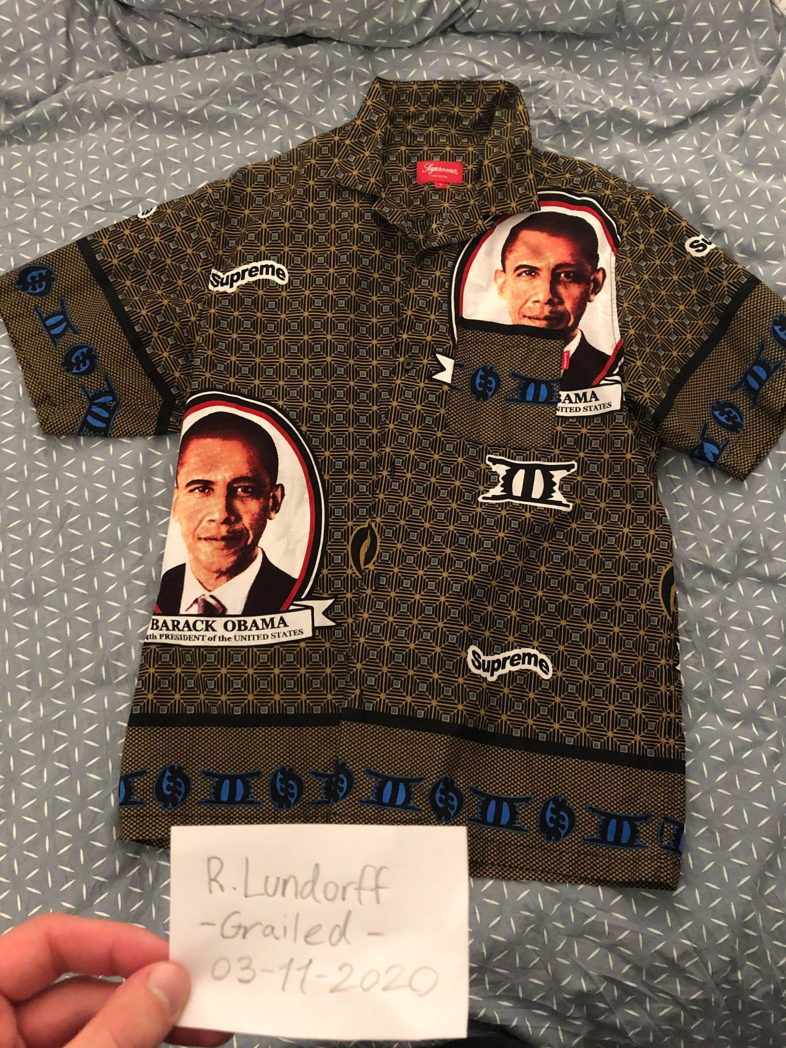 Obama in shop supreme shirt