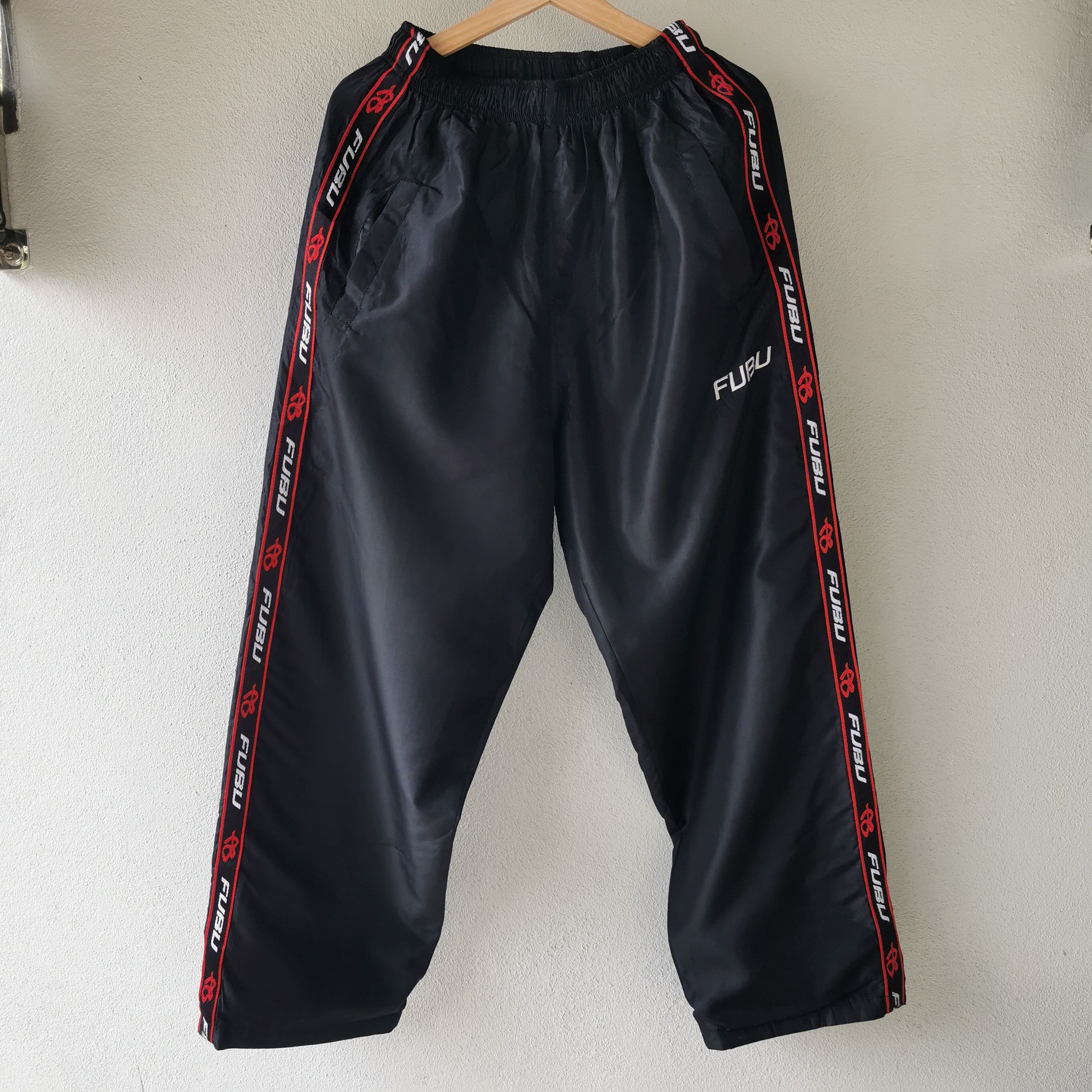 Vintage vintage fubu sidetape track pants | Grailed