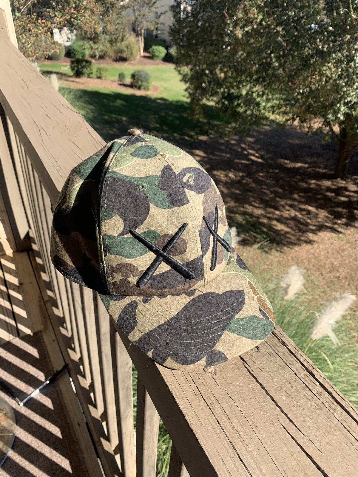 Bape Bape x kaws bendy camo fitted hat | Grailed