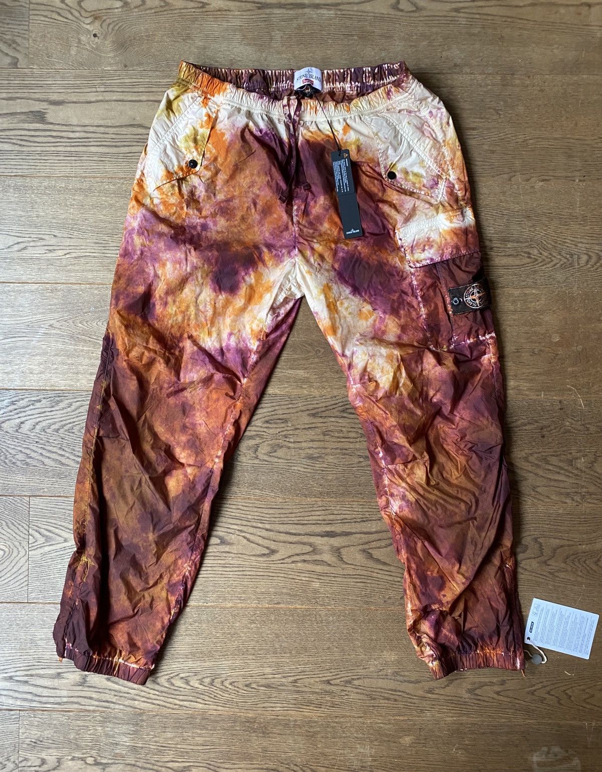 Supreme Supreme x stone island painted camo nylon cargo pants coral |  Grailed