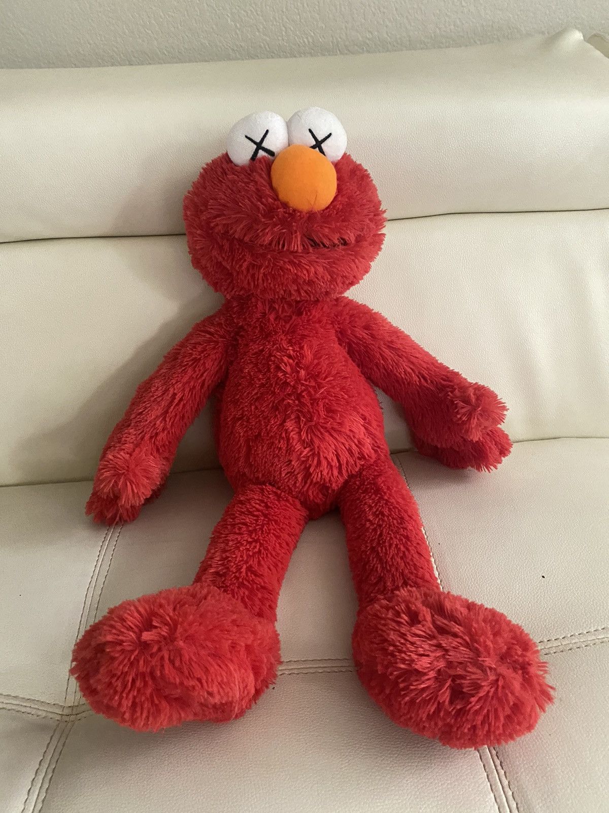 Uniqlo KAWS Elmo Plush | Grailed