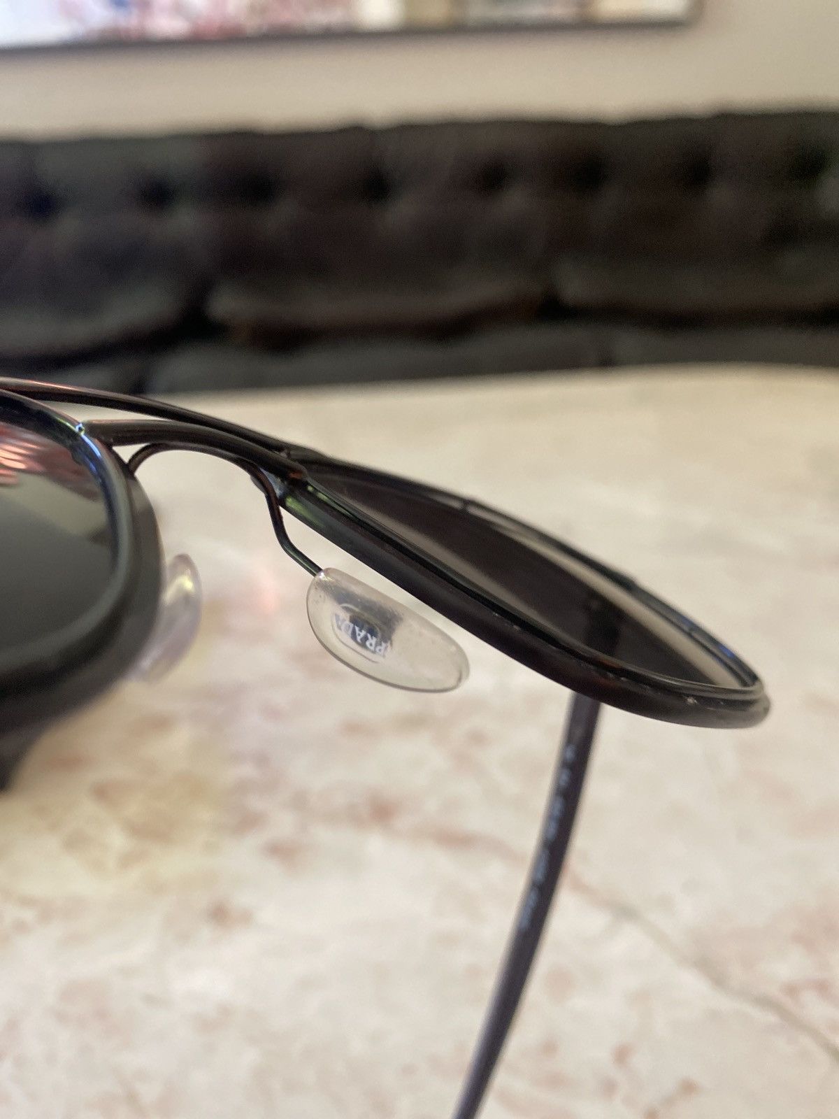 Prada Prada SPR59U sun glasses Grailed
