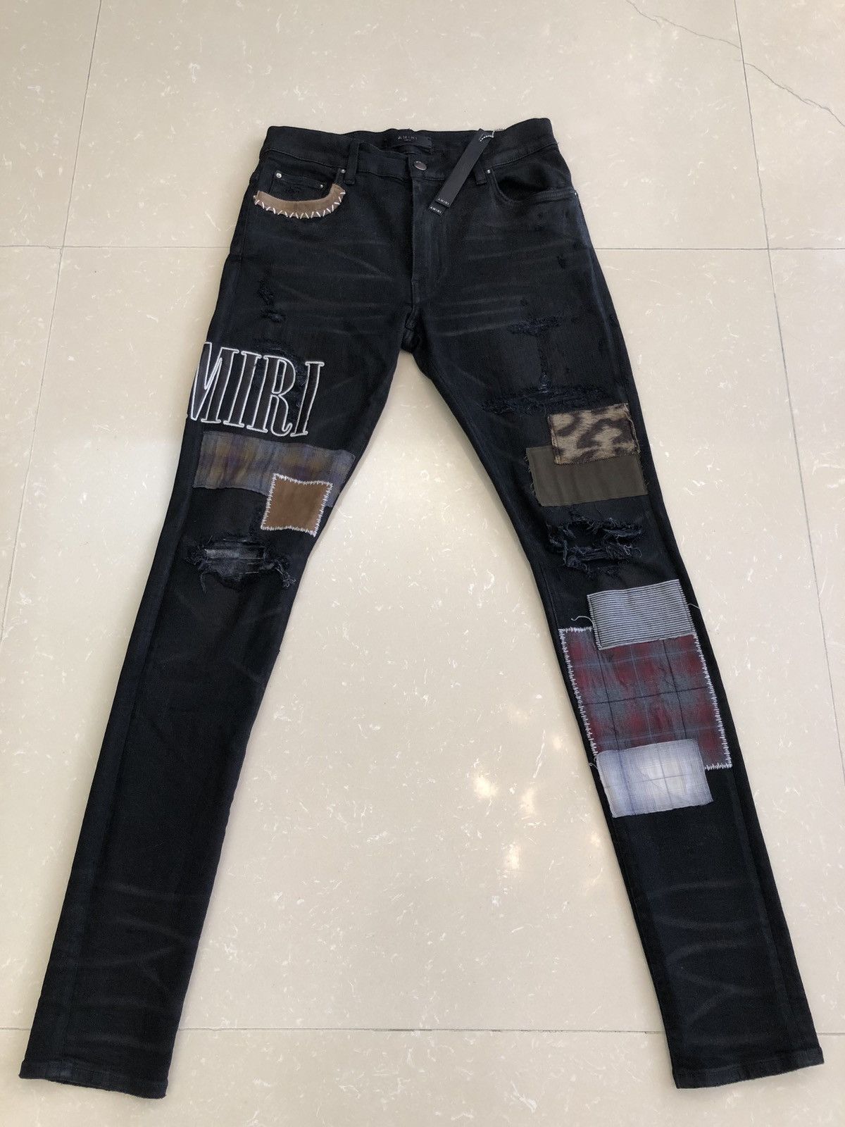 Amiri Black Grunge Patch Jeans | Grailed
