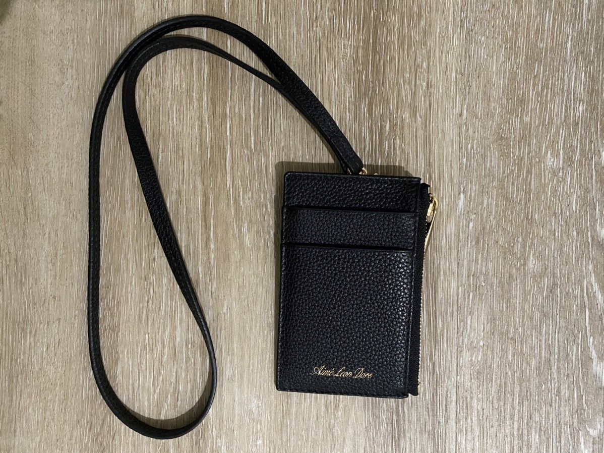 Aime Leon Dore Black Leather Neck wallet | Grailed