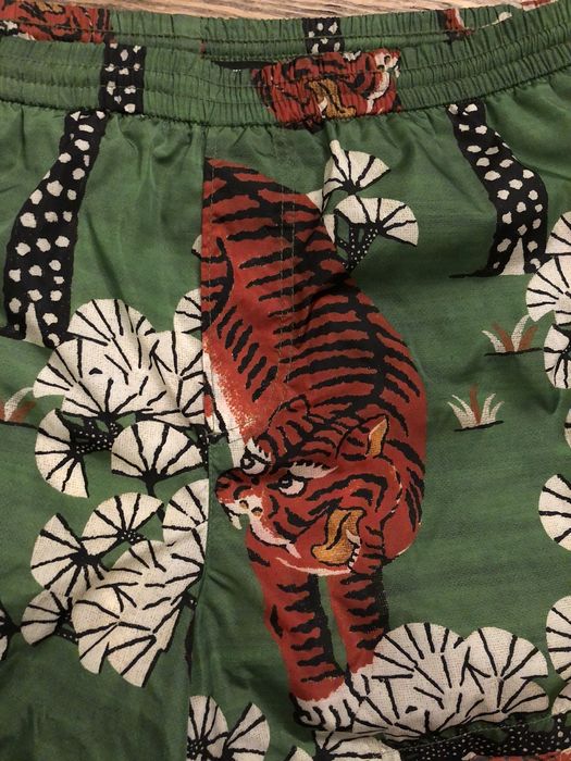 Gucci tiger cheap swim trunks