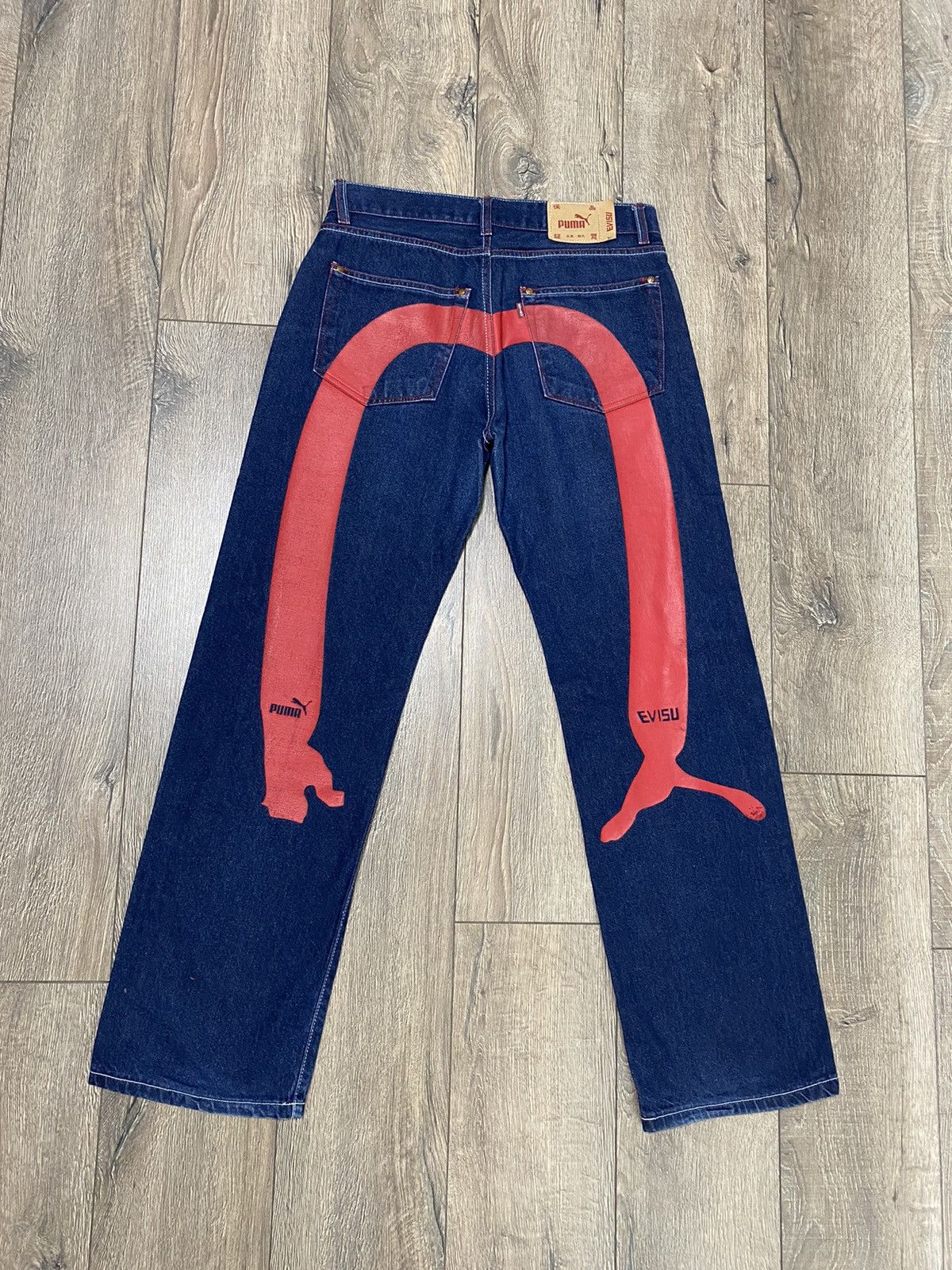 Evisu × Puma Evisu x Puma big logo jeans (33) | Grailed