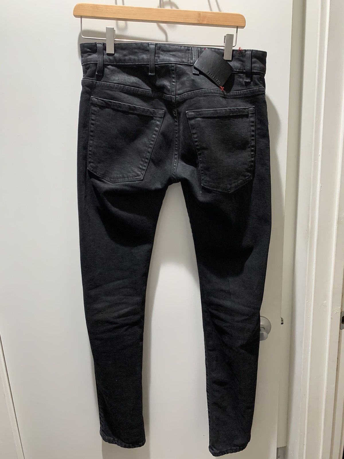Represent Clo. Flared Denim Wax Black | Grailed