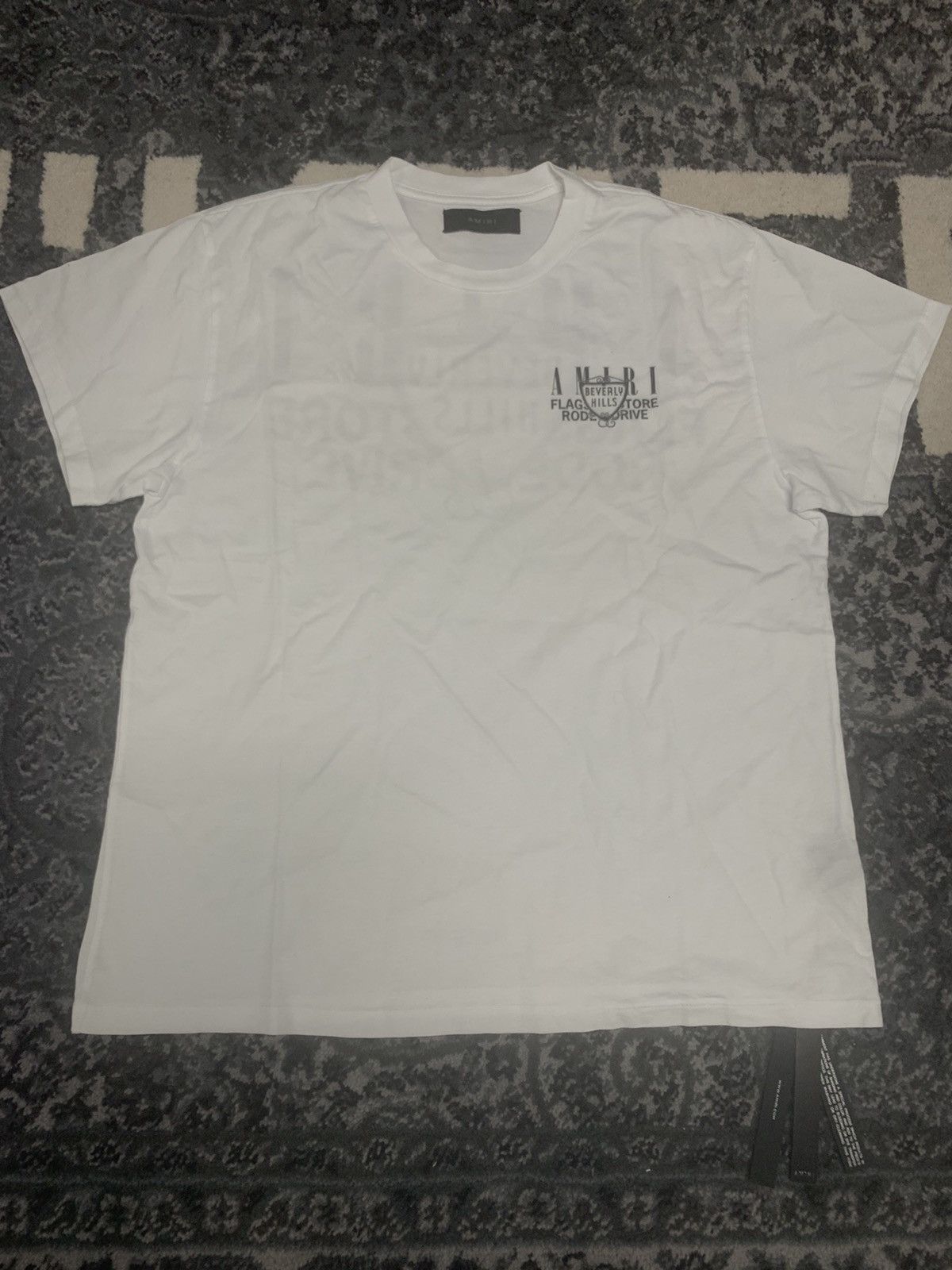Amiri Beverly Hills Tシャツ ホワイト エレガントなロゴ Amiri Beverly Hills Crewneck T Shirt White | ONU