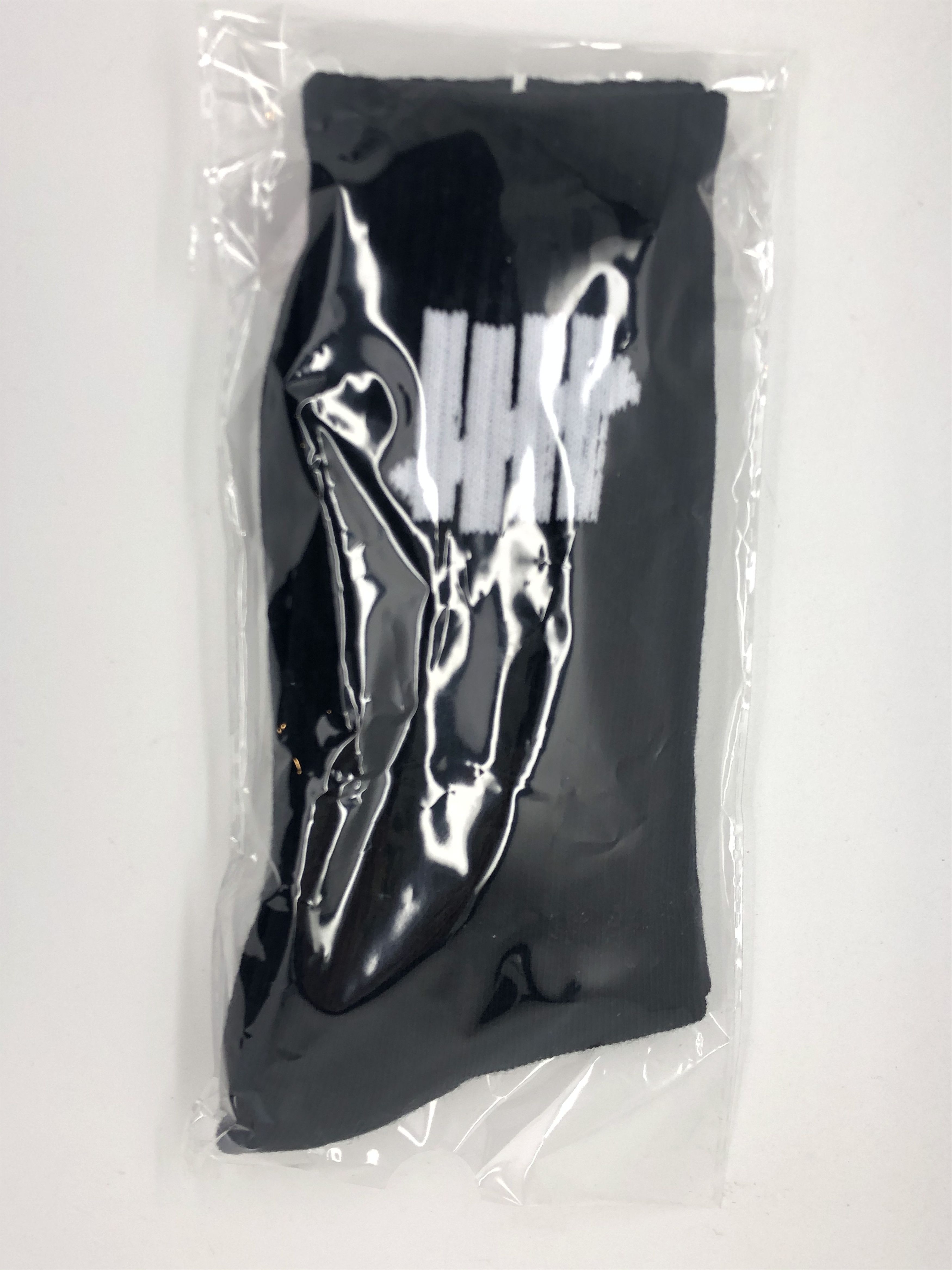 Anti Social Social Club × Undefeated DS Undftd x ASSC White Logo Fetish Black Socks in hand Size ONE SIZE - 2 Thumbnail