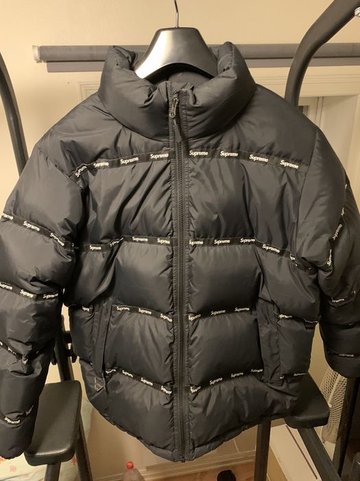 Supreme tape store logo puffer jacket