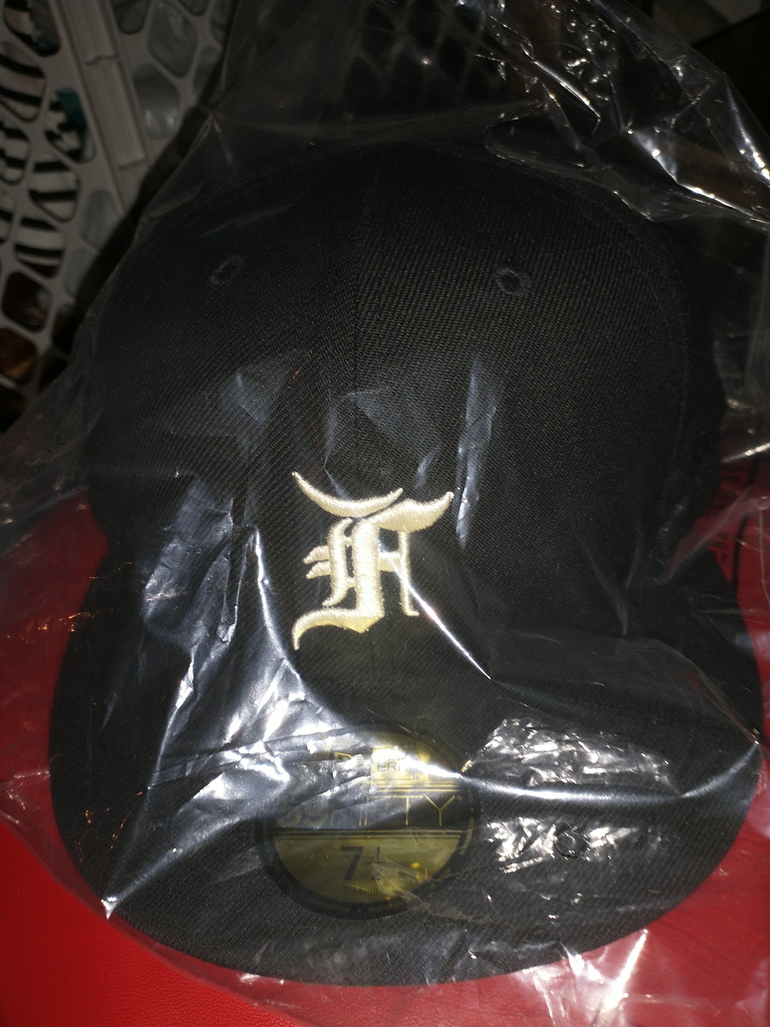 fear of god x new era