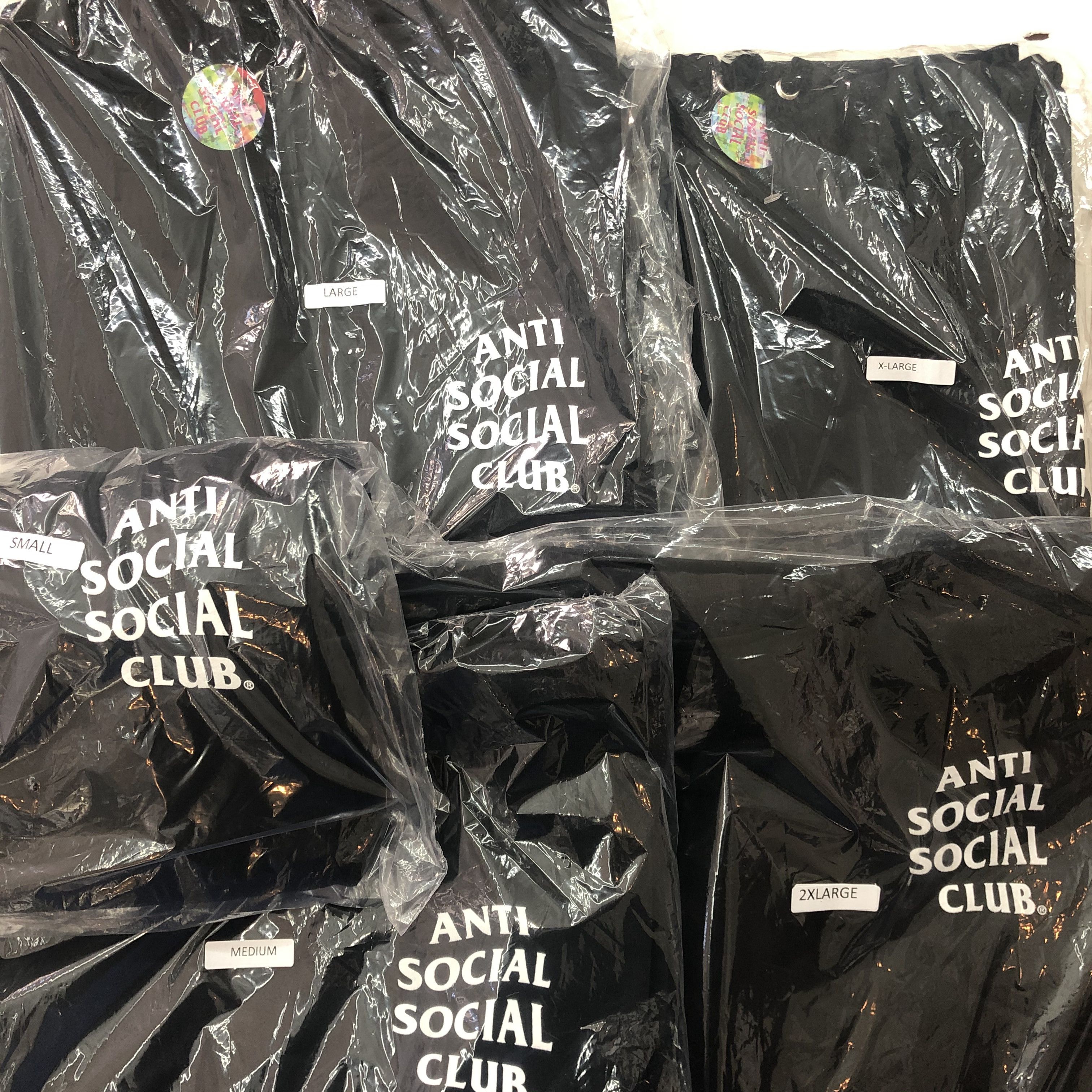 DS AW20 ASSC White Logo MInd Games Black Hoodie in hand FOG