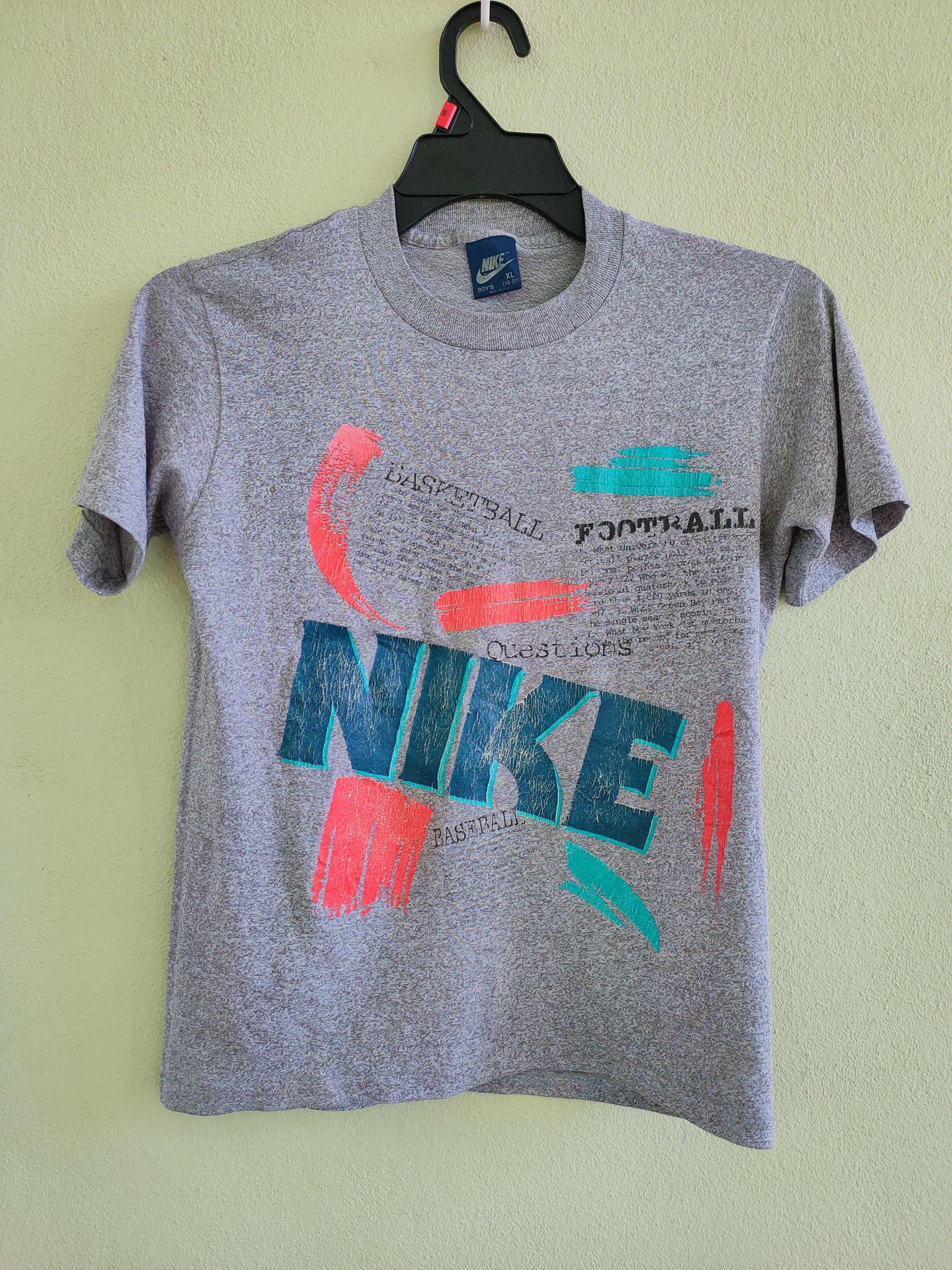 Vintage 80's NIKE BLUE TAG overprint tee