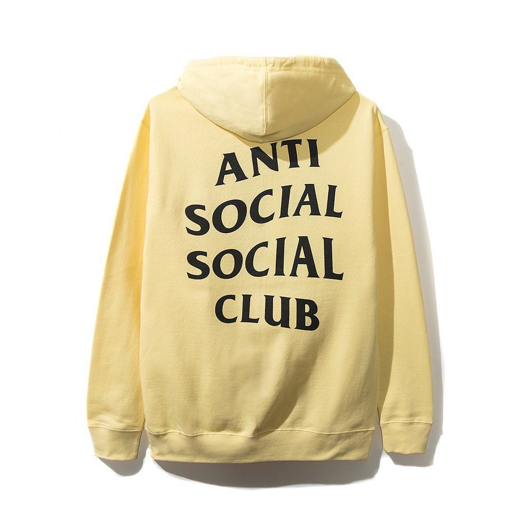 DS ASSC Black Logo Negativity Rules Yellow Hoodie in hand