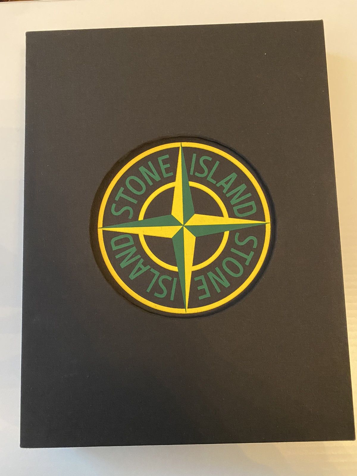 image of Stone Island Rizzoli Storia Coffee Table Book in Black, Men's