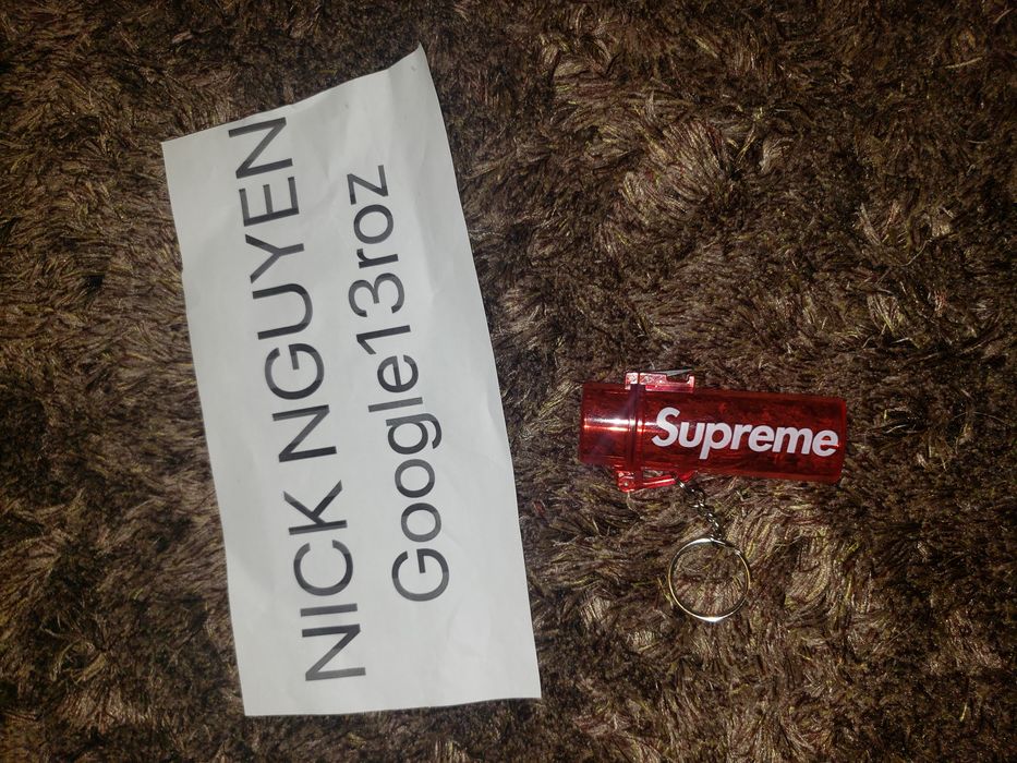 Supreme waterproof lighter case best sale keychain red