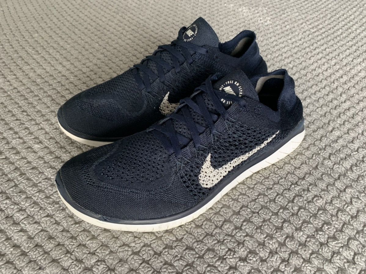 Nike free run flyknit navy best sale