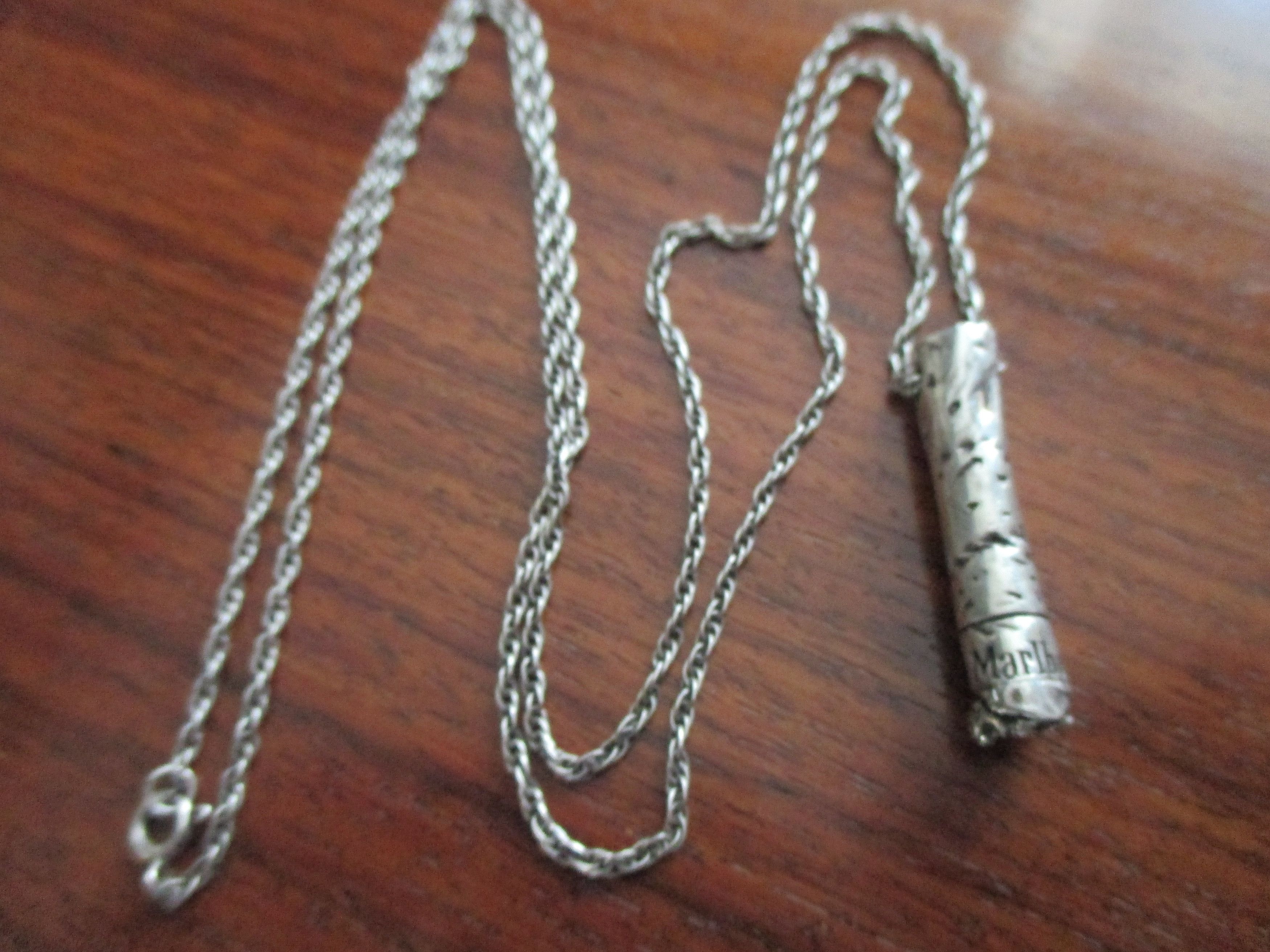 CAST OF VICES Low Res necklace