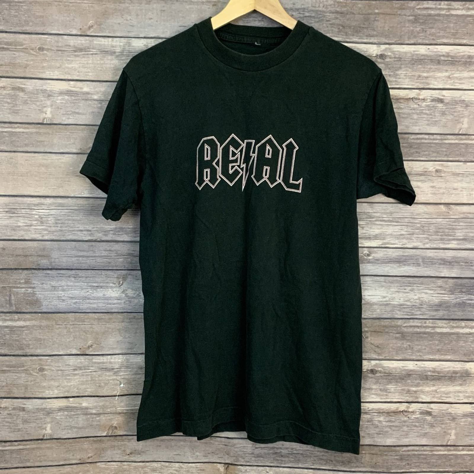 Vintage Vtg. 90s Real Skateboards AC/DC Iconic Logo Tee | Grailed