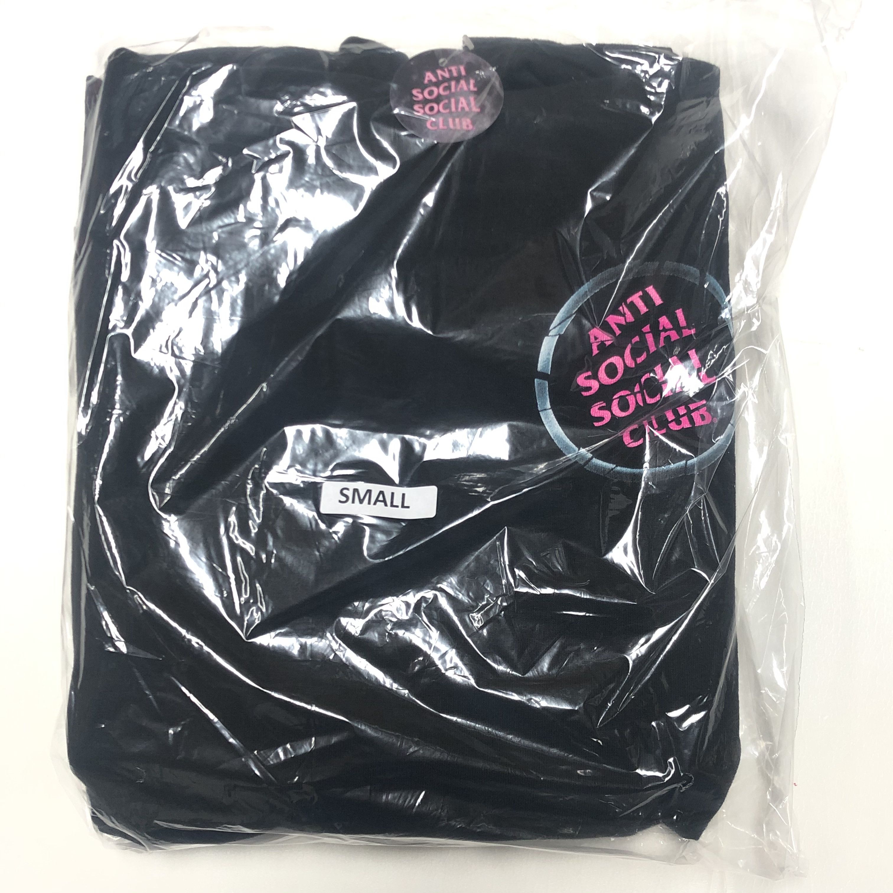 DS AW20 ASSC Pink Logo Brake Check Black Hoodie in hand