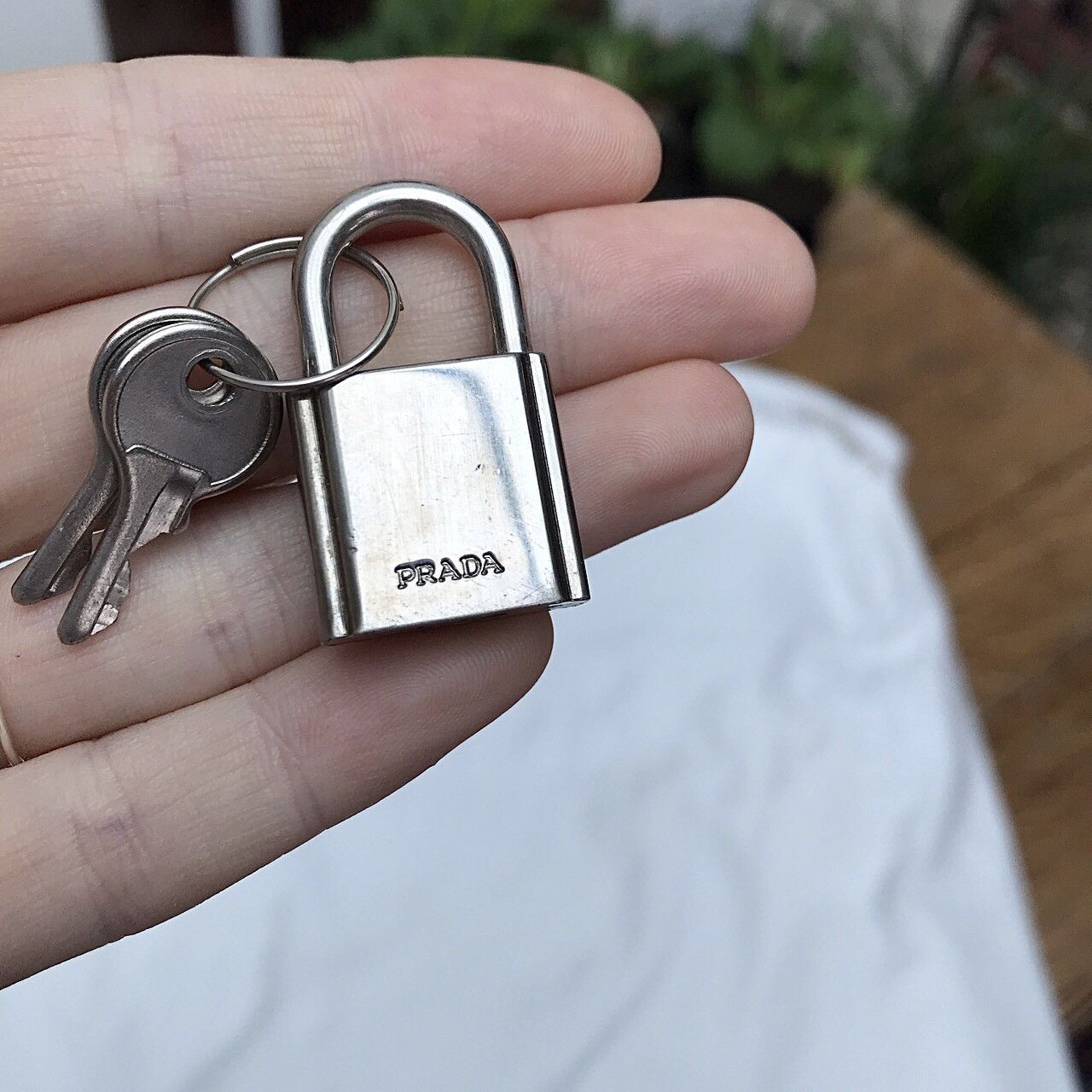 Prada Prada padlock and key Grailed