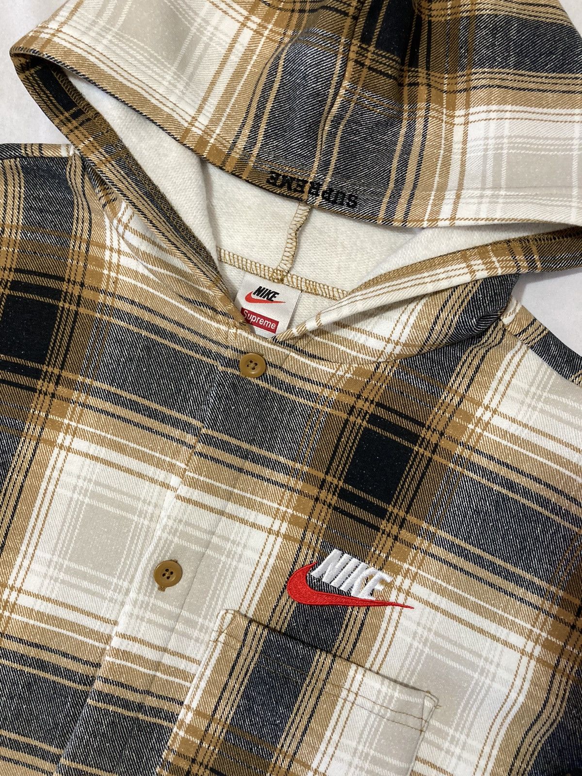 Supreme nike plaid hot sale hooded sweatshirt mustard