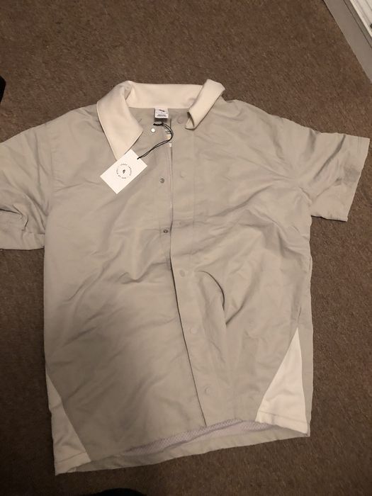 Nike Nike x fear of god nrg SS shooting shirt | Grailed