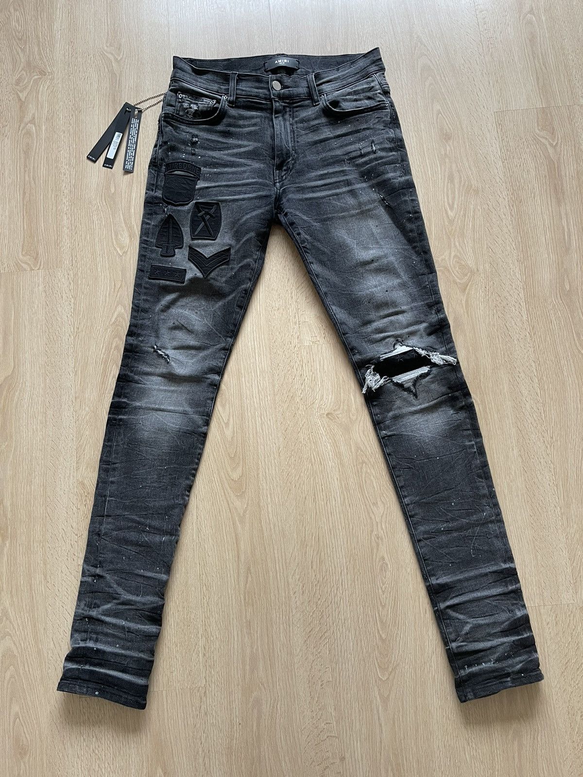 Amiri Painter Military Patch Jeans W9M01327SD | Grailed
