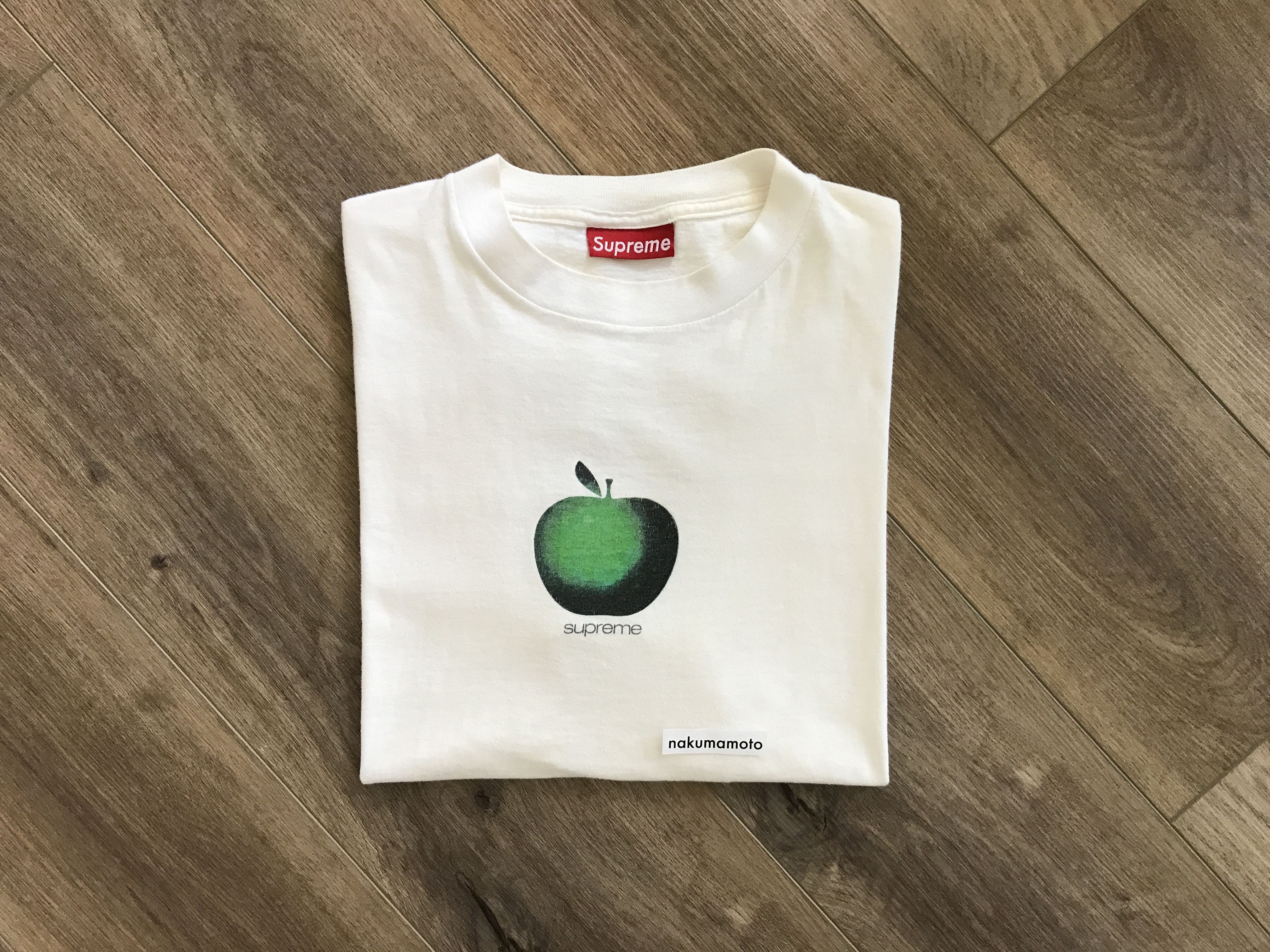Supreme apple shirt sales