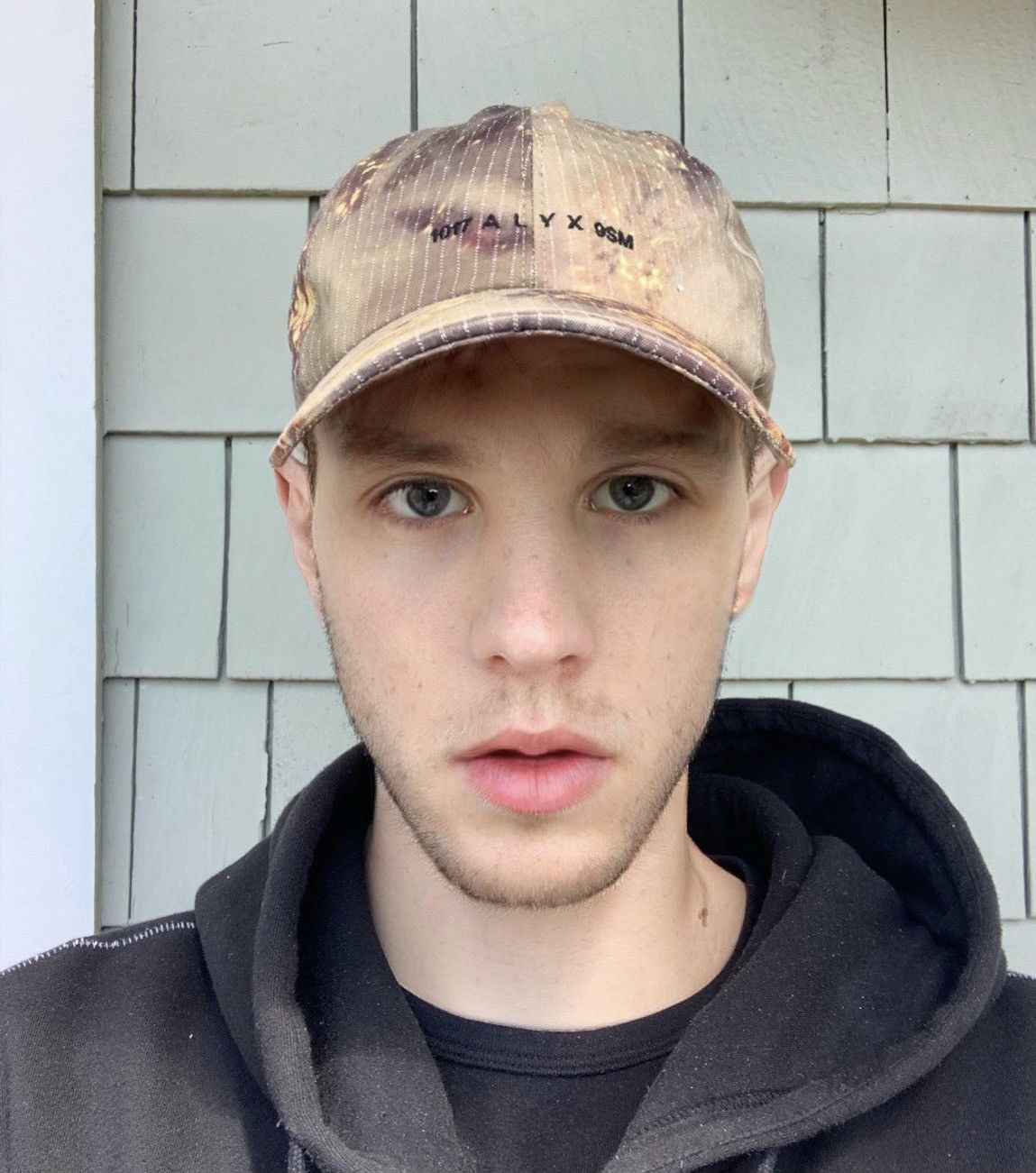 Alyx cap with buckle clearance