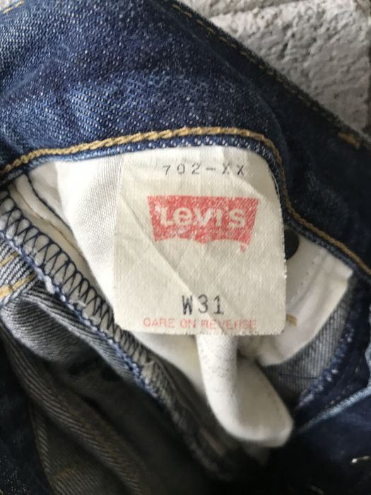 Vintage Distressed Levis 702 Big E Selvedge made in Japan | Grailed