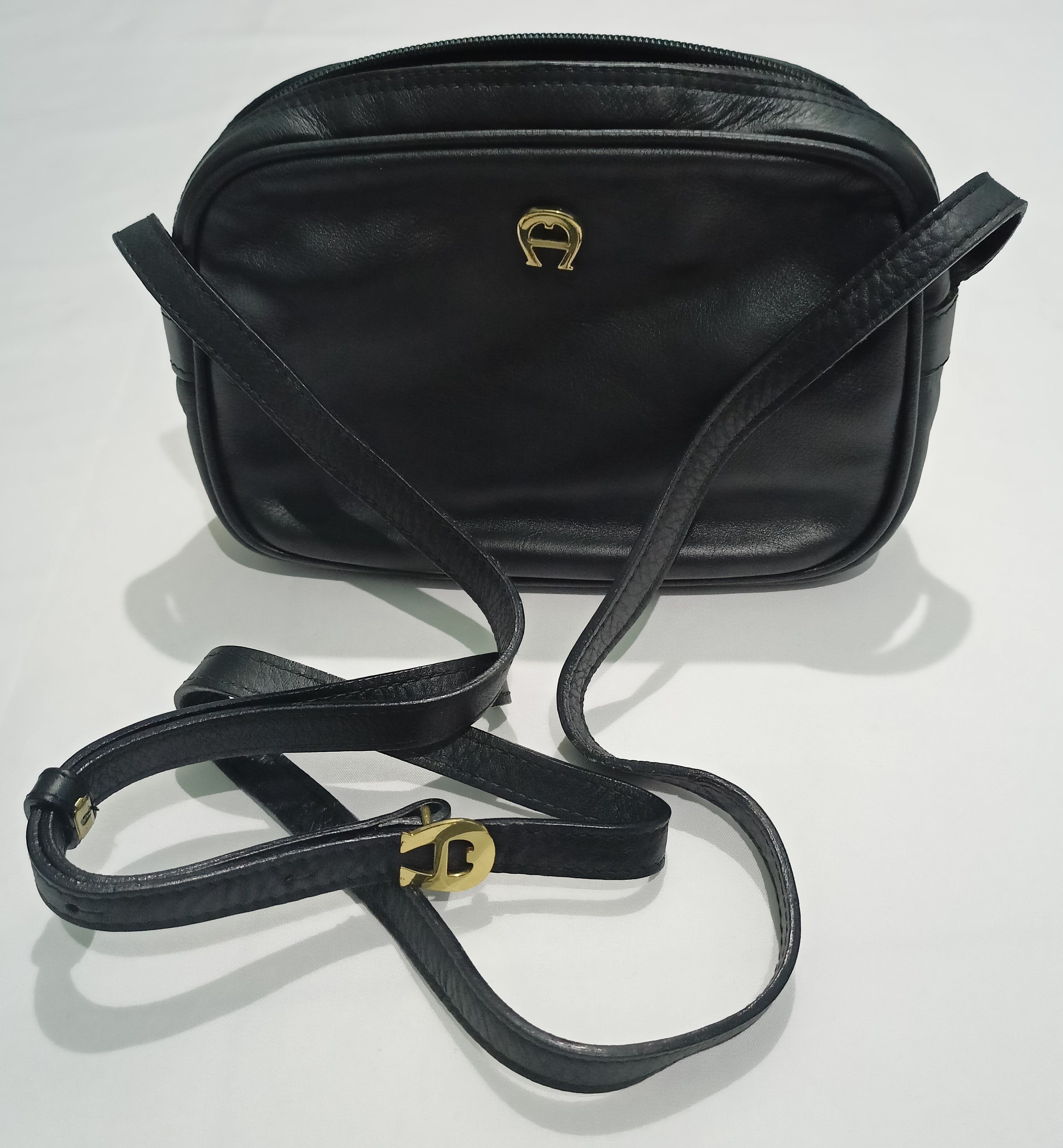 etienne aigner sling bag