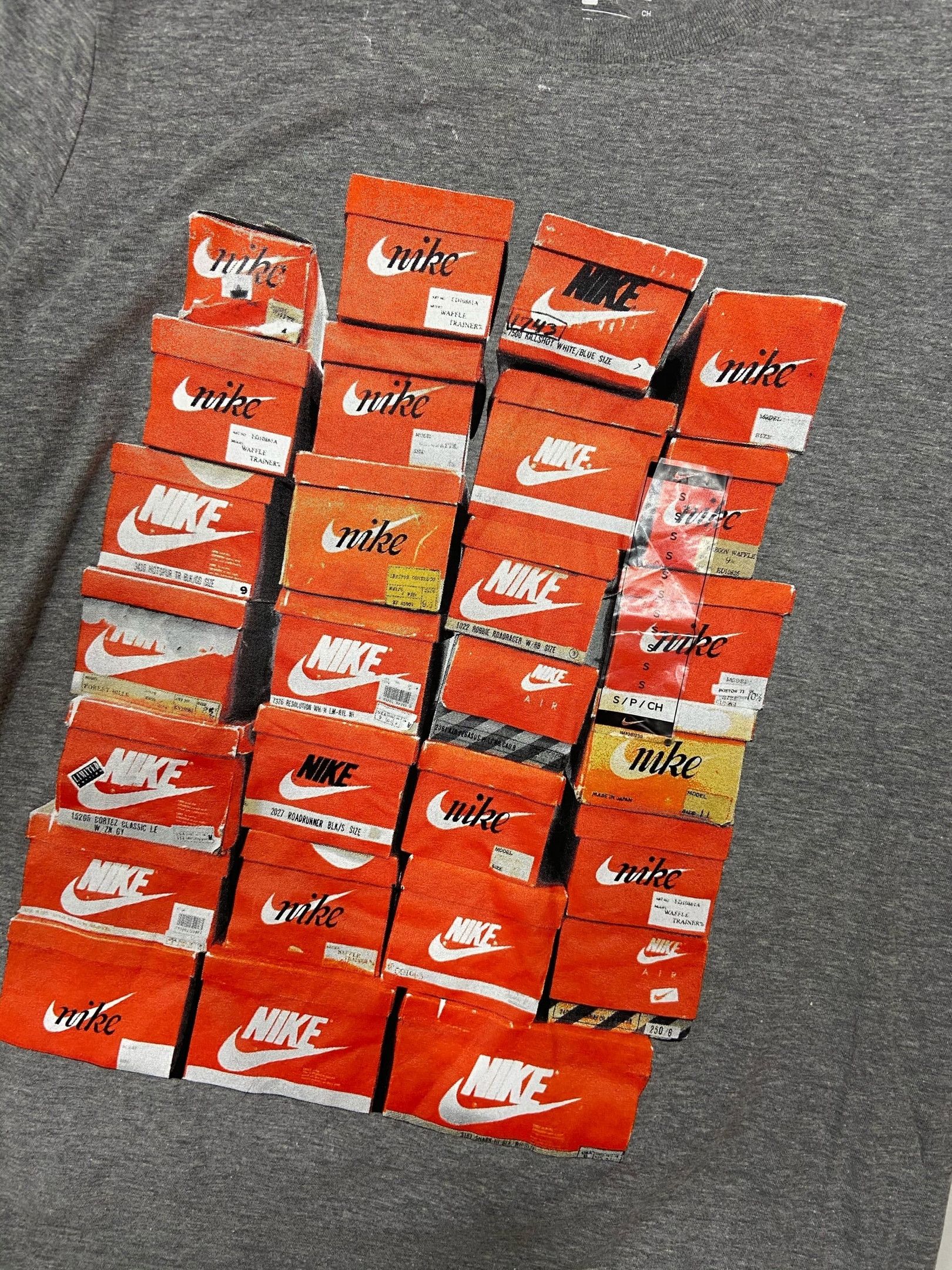 Nike shirt with nike boxes on it best sale